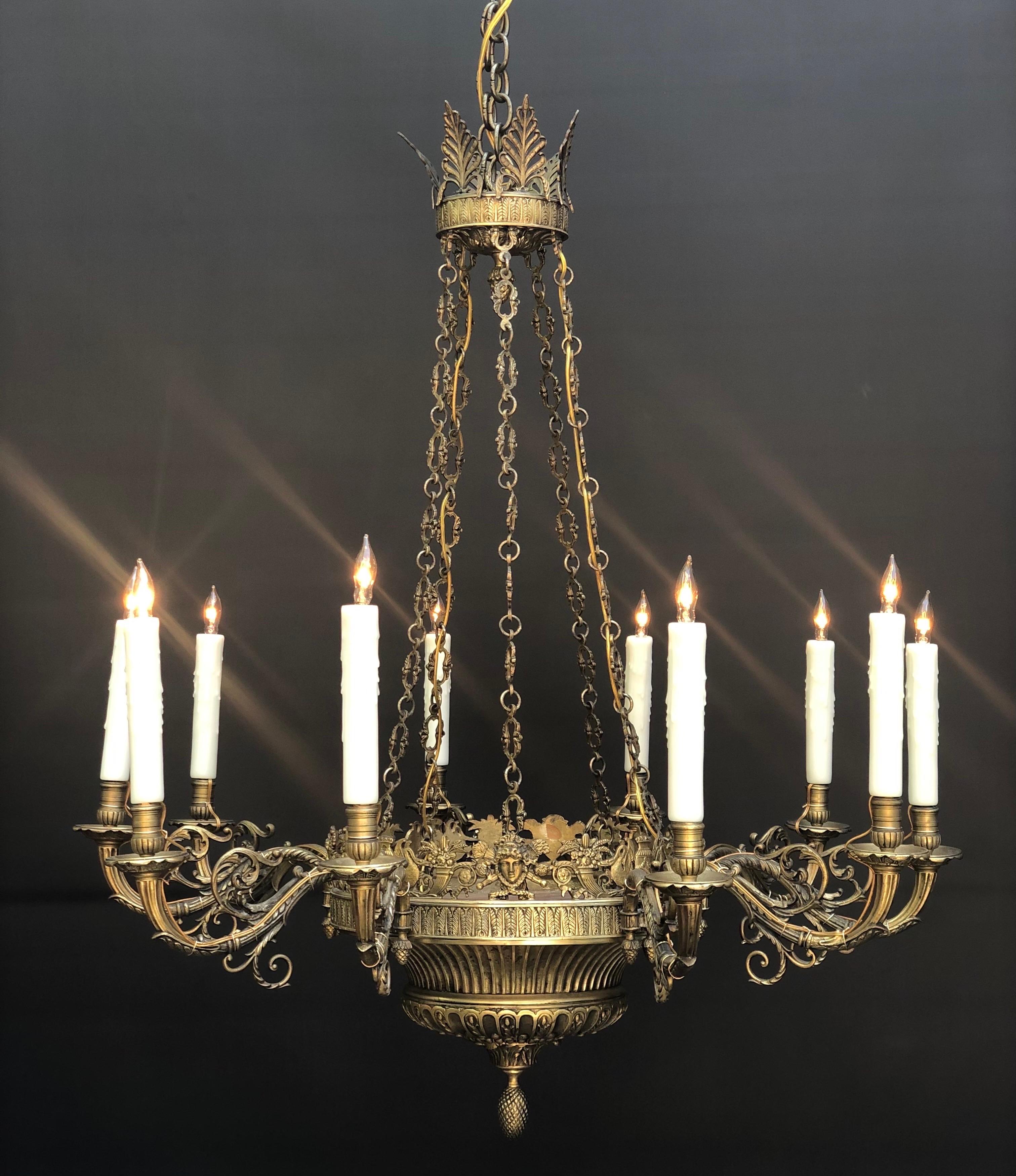Exceptional bronze Italian Neoclassical bronze chandelier is made in the early 19th century. The classical style chandelier is made of bronze in the finest casting. The cast bronze crown is topped with six pierced Anthemion leaves on a fine cast