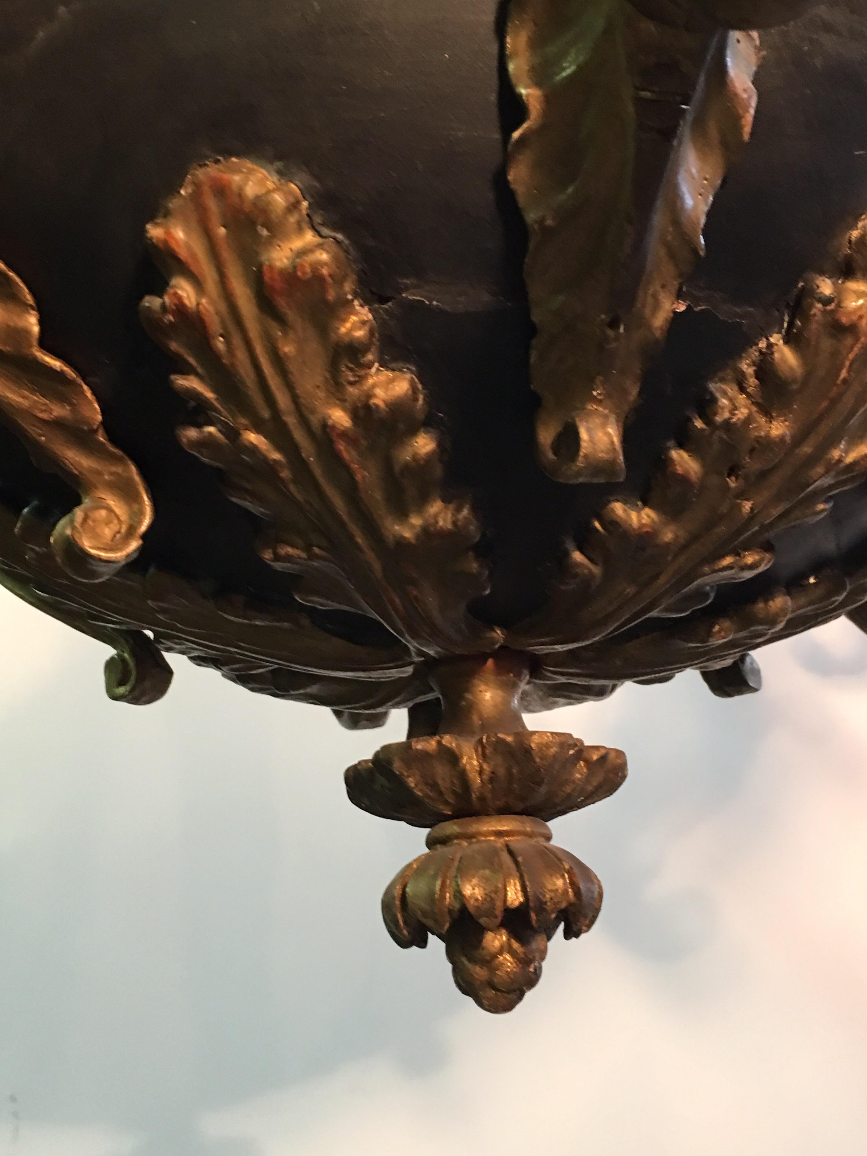 wood and bronze chandelier