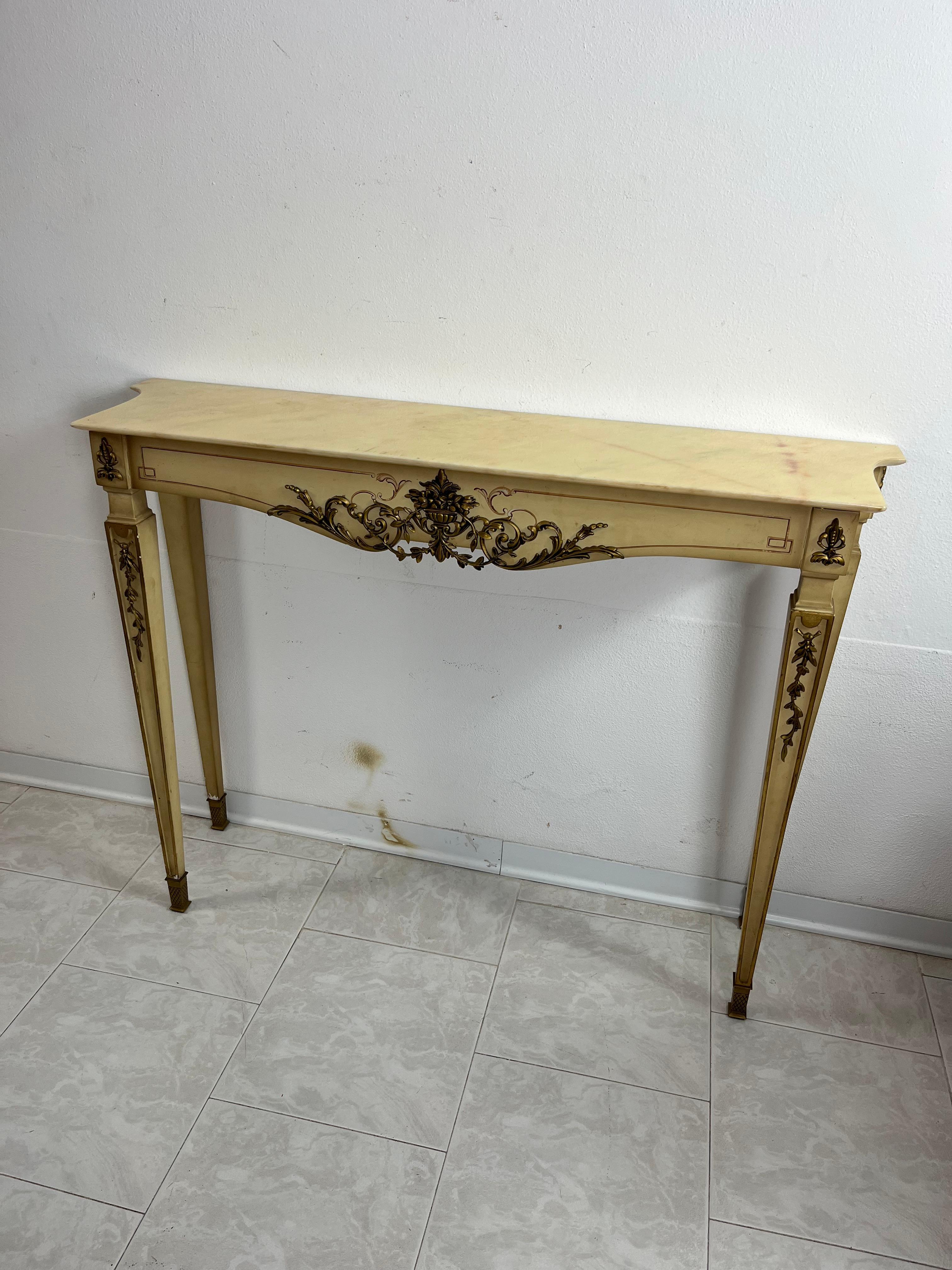 Italian neoclassical console in lacquered wood with marble top, 1930s
Intact and in good condition, small signs of aging.