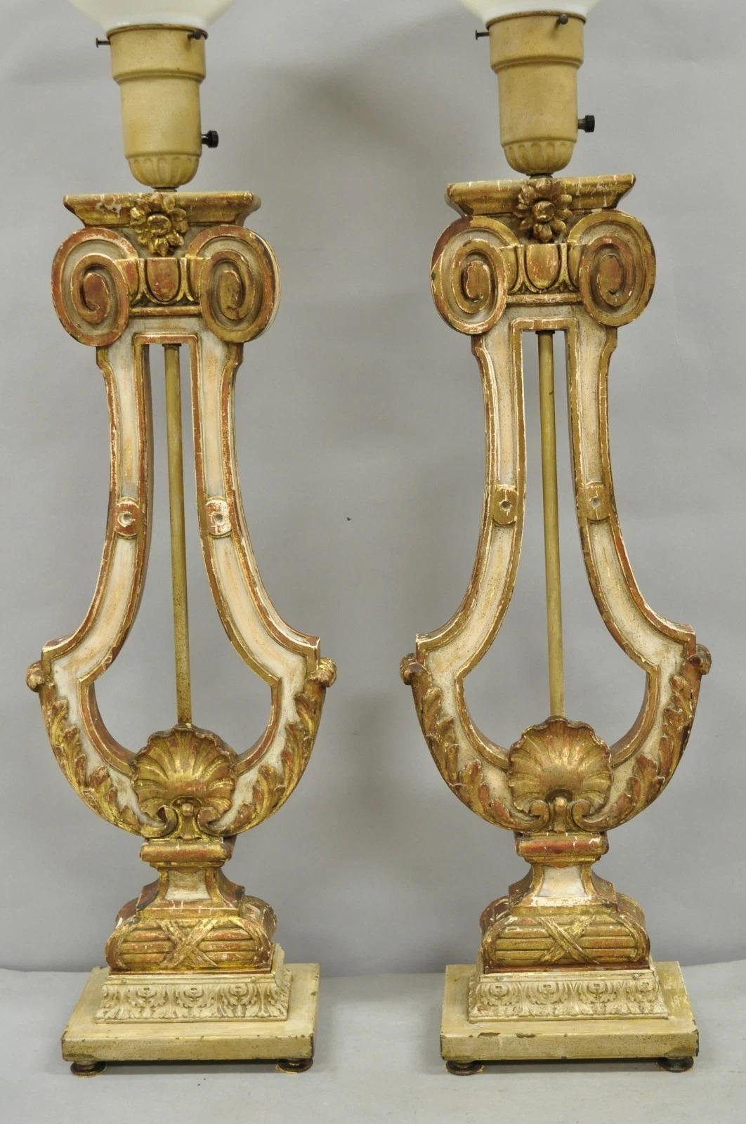 Unknown Italian Neoclassical Cream & Gold Gilt Carved Wood Harp Column Table Lamp - Pair For Sale