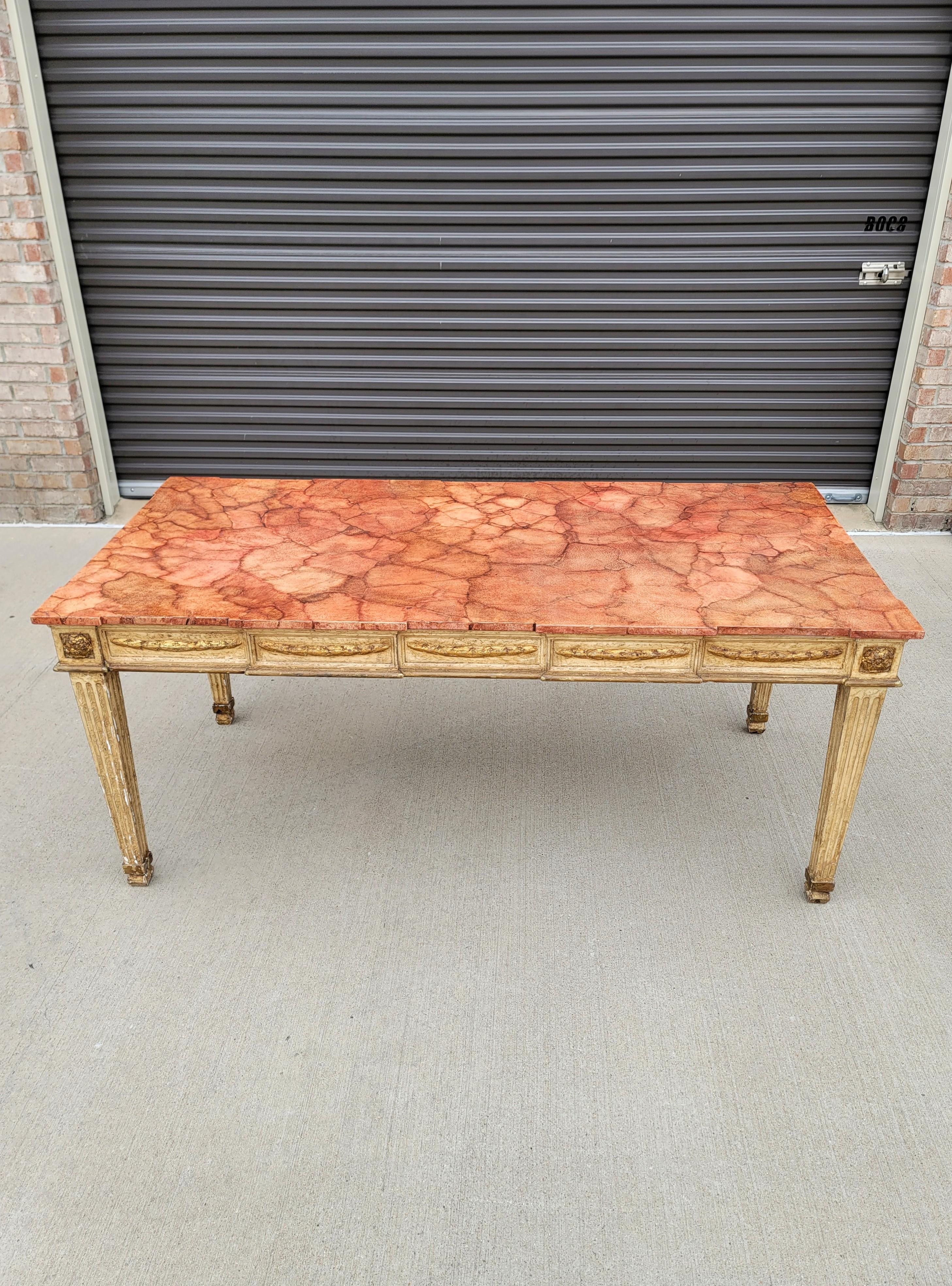 Patina Perfection!! A rare and most impressive Italian hand carved, painted parcel gilt faux marbled verona rosso top table with beautifully aged heavily distressed patina.

Born in Italy in the early 20th century, hand-crafted in elegant and