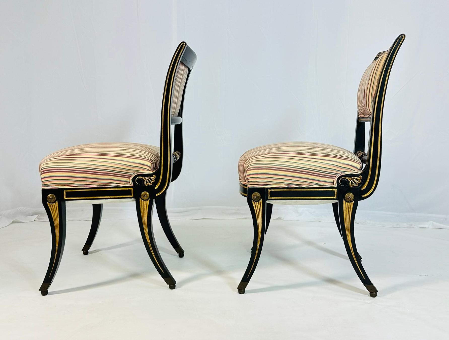 North American Italian Neoclassical Ebonized and Parcel Gilt Slipper Chairs For Sale