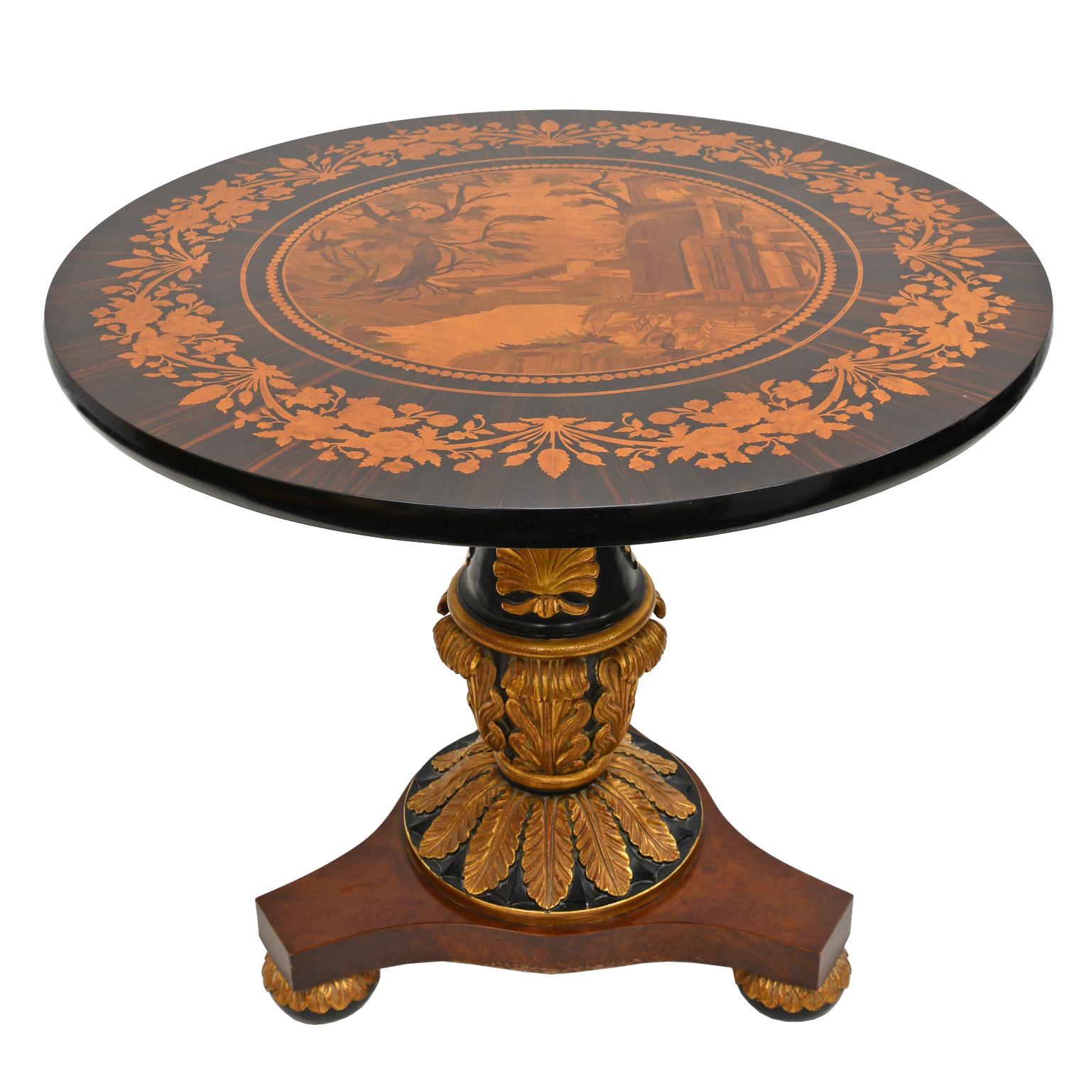 A fine reproduction Italian neoclassical table with ebonized round top with rosewood banding embellished with marquetry inlays in various woods of floral & foliate design along border & a landscape scene in the center panel that includes large