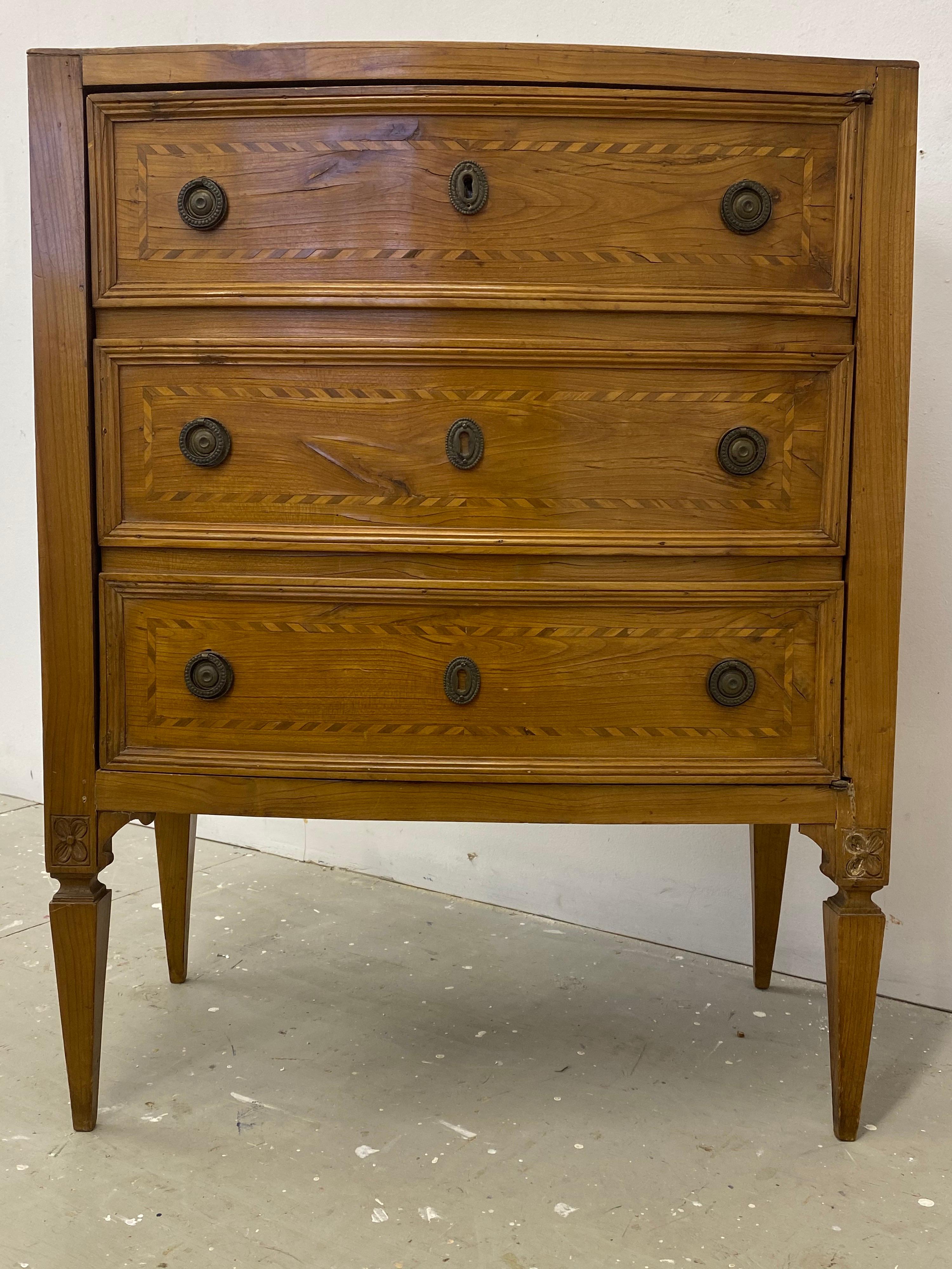 Italian neoclassical inlaid faux 3 drawer bowed front 1 door commode. Uncommon form with one swinging door that has the appearance of 3 pull out drawers. Inlaid top and sides. Overall very solid, but shows some imperfections that are to be expected