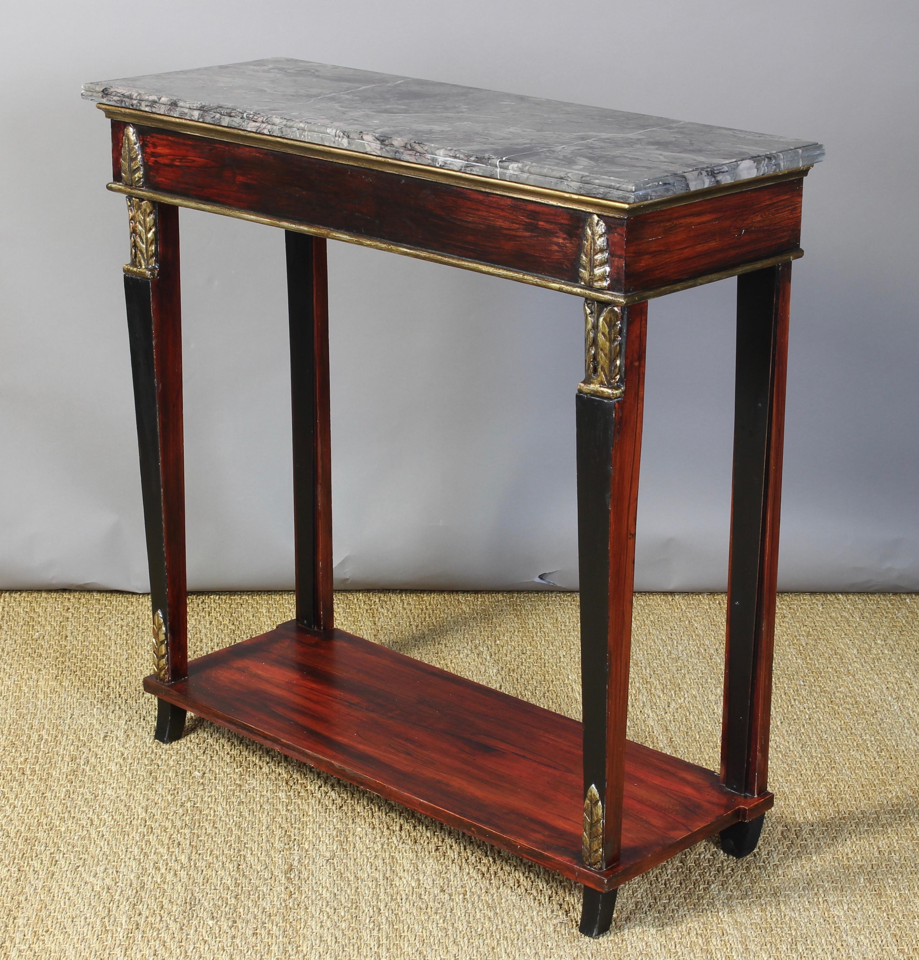 A small and charming mid-20th century Italian neoclassical styled console table with faux rosewood graining and ebony and gilt accents with nicely figured gray marble top.