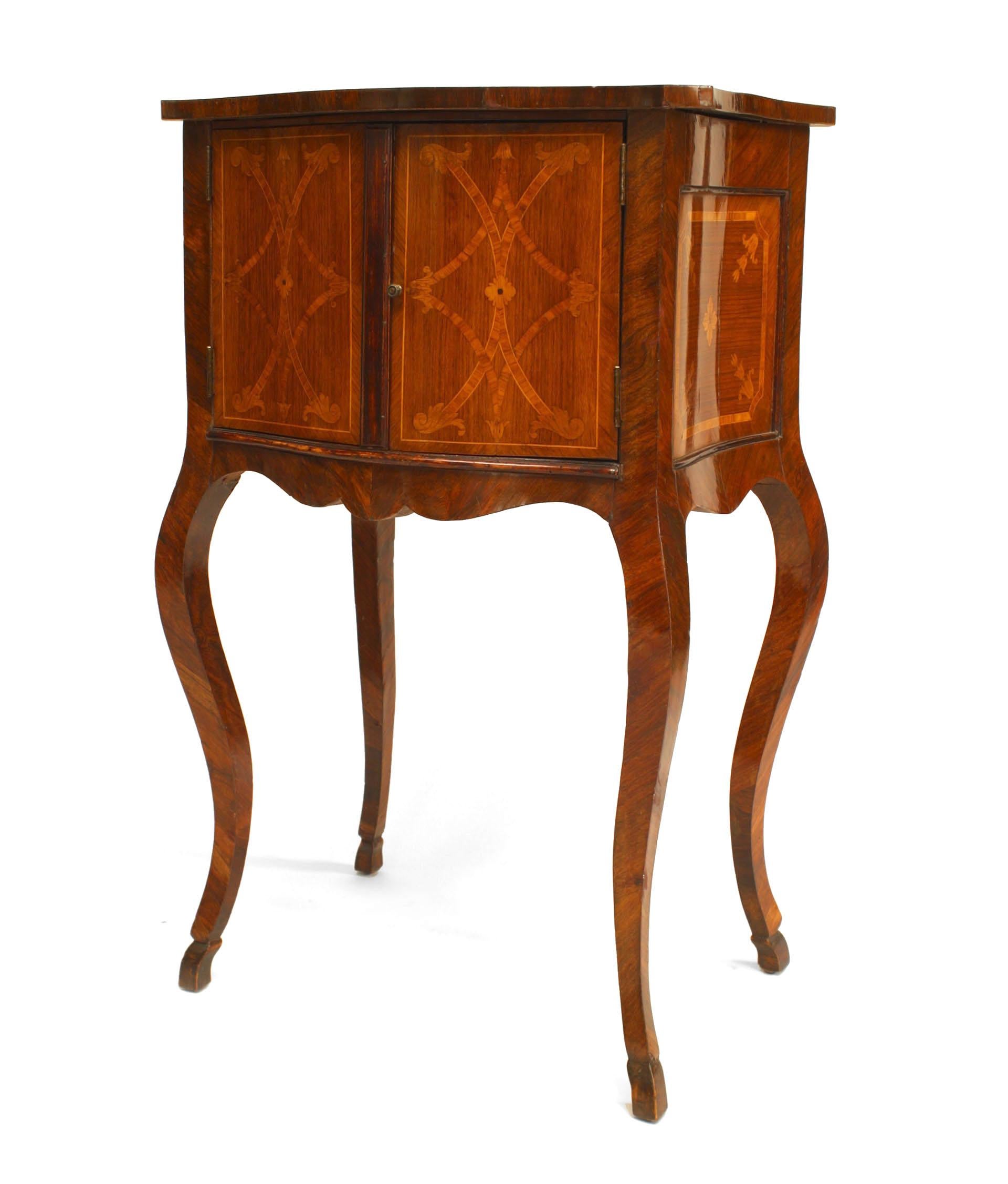 Italian Neoclassic-style (19th Century) small walnut bedside commode with tulipwood and marquetry inlaid design on top, sides, and back, and two front-facing doors.

