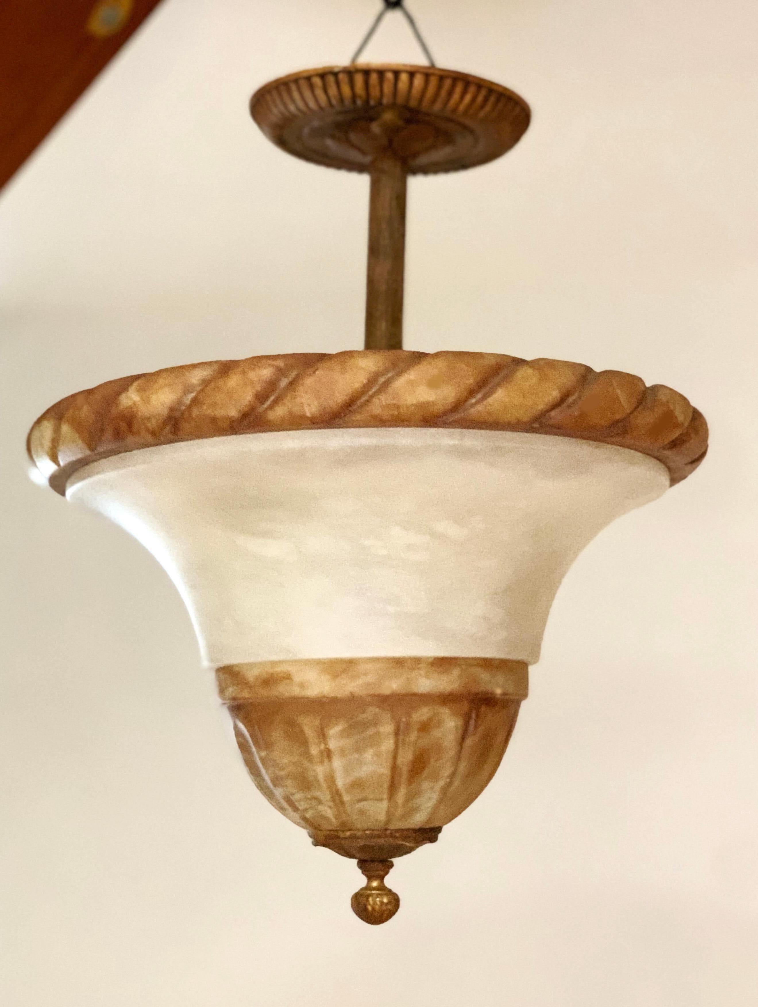 Elegant Italian alabaster modern neoclassical pendant or chandelier in a Classic, pure form that references the Italian 'Novecento' and Art Deco periods. Three lights are inside the fixture.