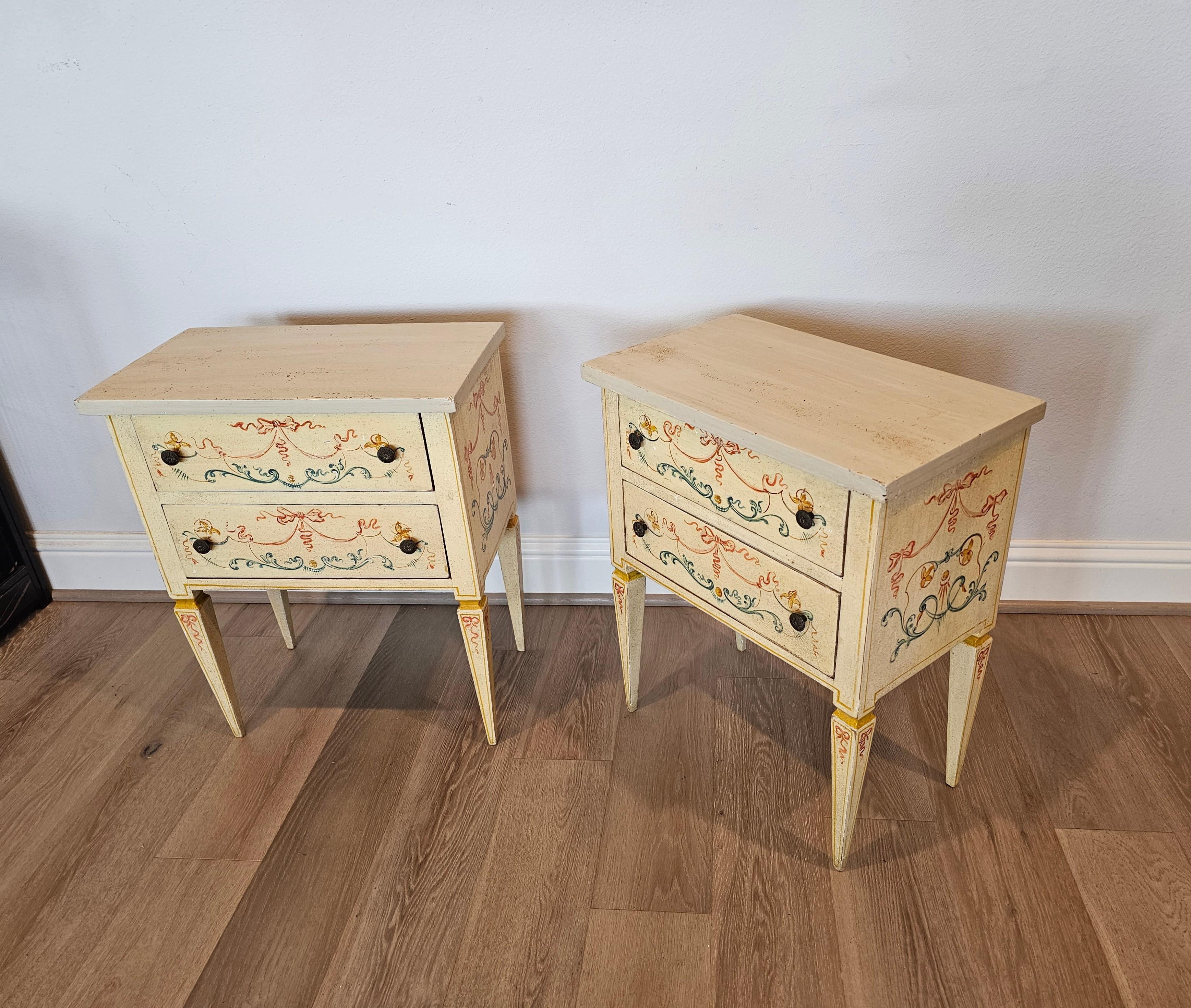 A fabulous pair of vintage Italian Neo-classical original hand-painted nightstands.

Born in Italy in the mid-20th century, hand-crafted in timeless 18th century Neoclassical inspired Louis XVI taste, solid wood construction, having a greige