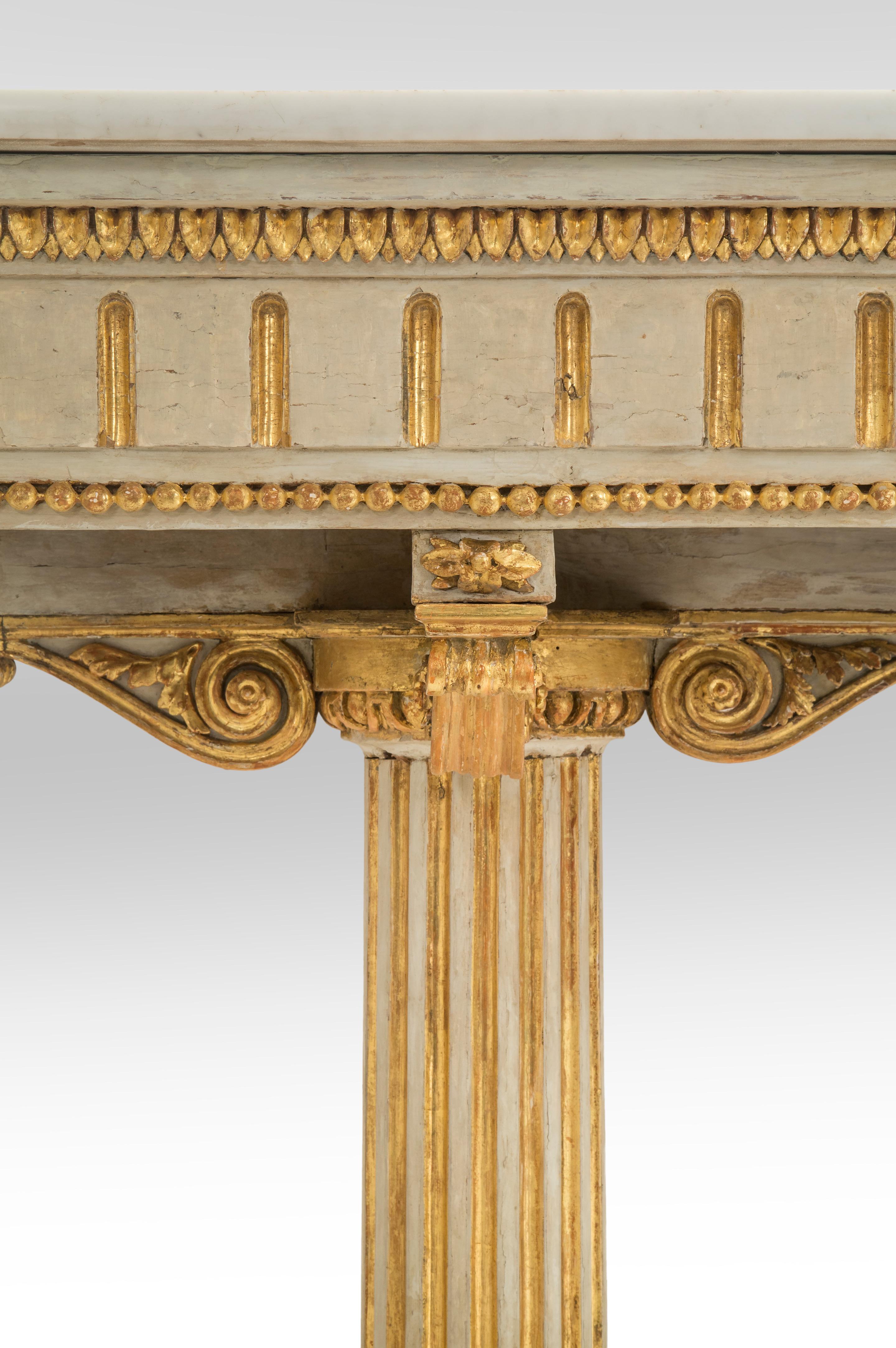 Italian neoclassical painted and parcel-gilt console table.
Genoa, last quarter of 18th century.
This classic design distinctive to Genoa was unprecedented in its inventive columnar form. The rectangular white Carrara marble-top, above a