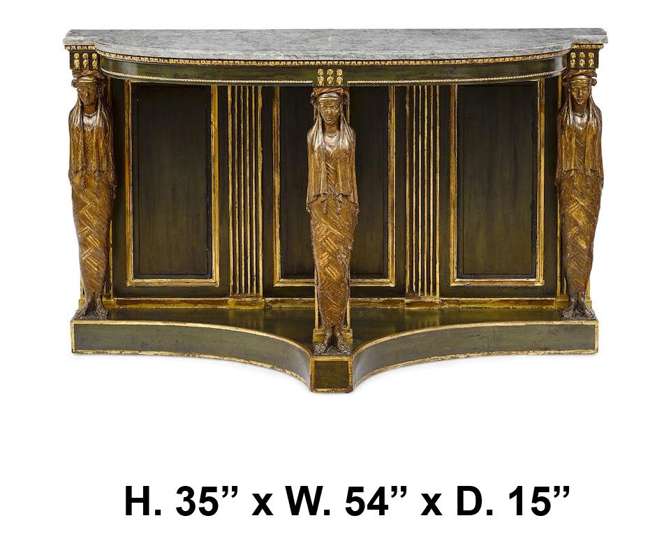 An Italian Neoclassical parcel gilt and paint decorated console with three carved figural supports, late 18/early 19 century.
The grey moulded marble top over green painted and parcel gilt freeze resting on three carved giltwood Neo-classical