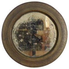 Miroir circulaire en bronze patiné de la période néoclassique italienne, début du XIXe siècle
