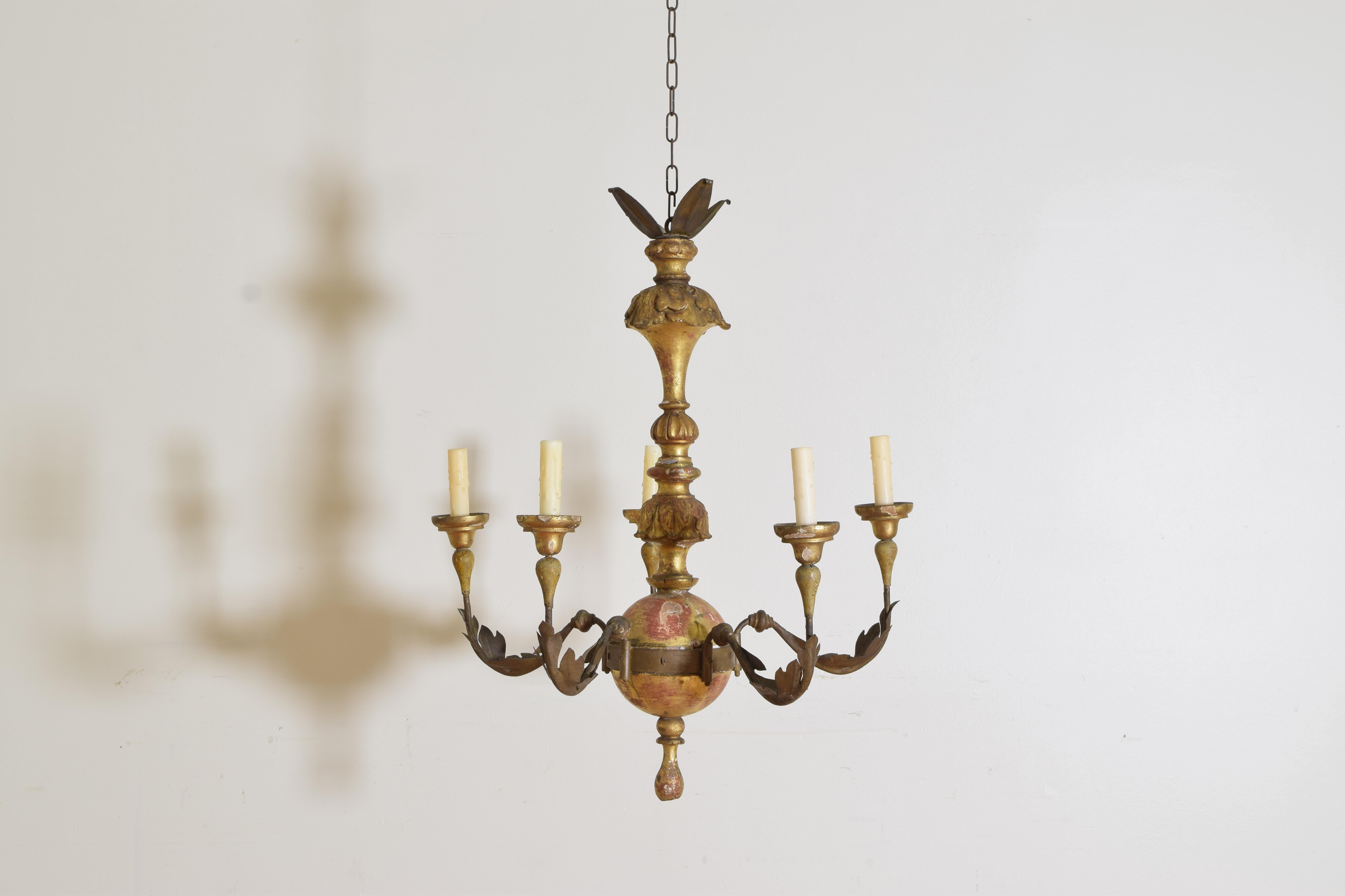 Having a turned and carved giltwood standard featuring a large sphere in the lower section, the sphere encircled by an iron frame issuing 5 (removable) arms, each arm with an applied gilt metal leaf and a turned giltwood bobeche.