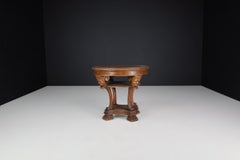 Italian Neoclassical Round Walnut Center Table with Carved Figural Legs, 1920s