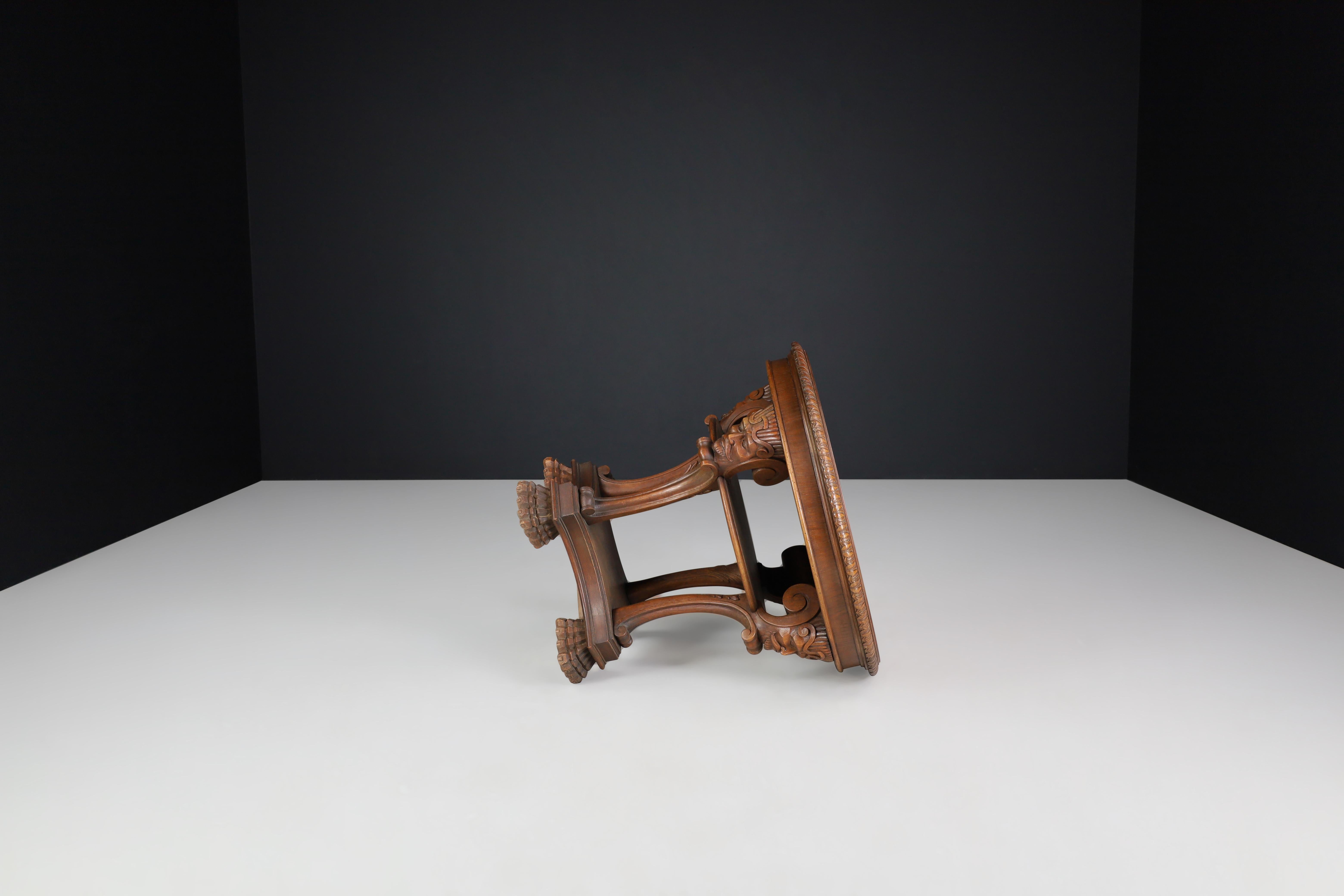 Italian Neoclassical Round Walnut Center Table with Carved Figural Legs, 1920s For Sale 2