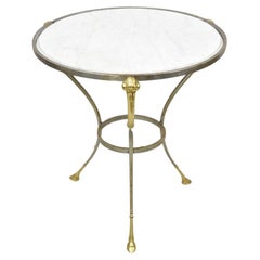 Mesa auxiliar de mármol redonda de metal con cabeza de carnero y latón de estilo neoclásico italiano