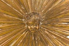 Italian Neoclassical-Style Carved Giltwood Sunburst and Putti Wall Plaque
