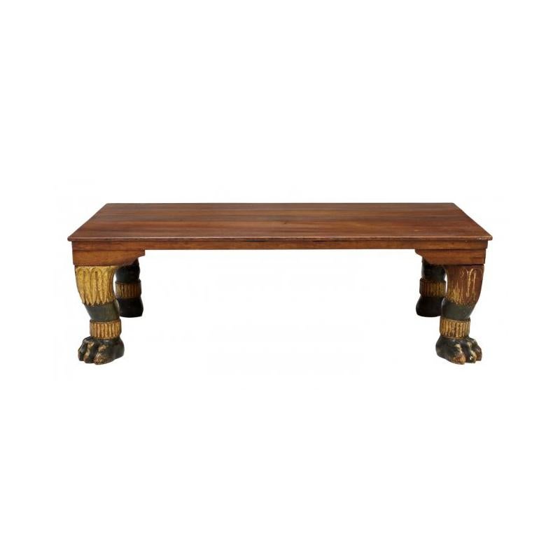 Impressive Italian neoclassical style low coffee table, early 20th century.

The polished rectangular top rests on four hand carved, hand painted and parcel gilt lion monopodiae. 

