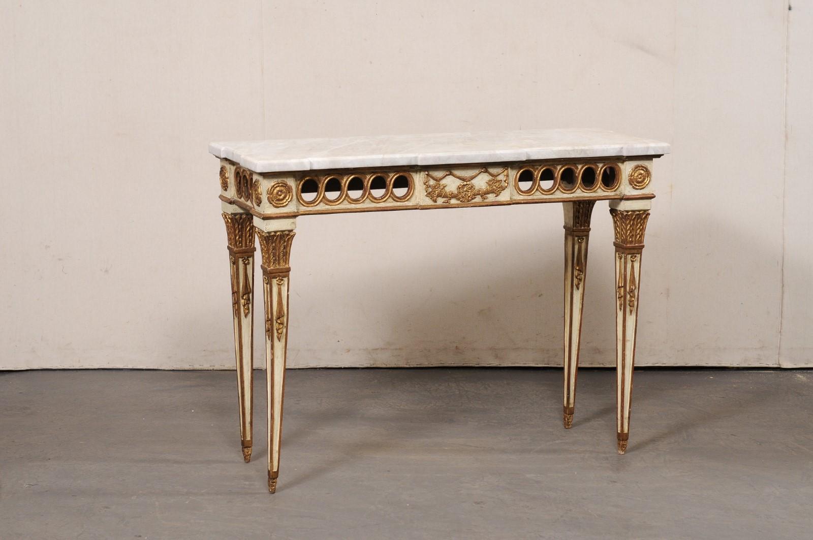 An Italian Neoclassic style carved-wood console, with original finish and a new quartzite top, from the mid 20th century. This vintage table from Italy has a new custom 