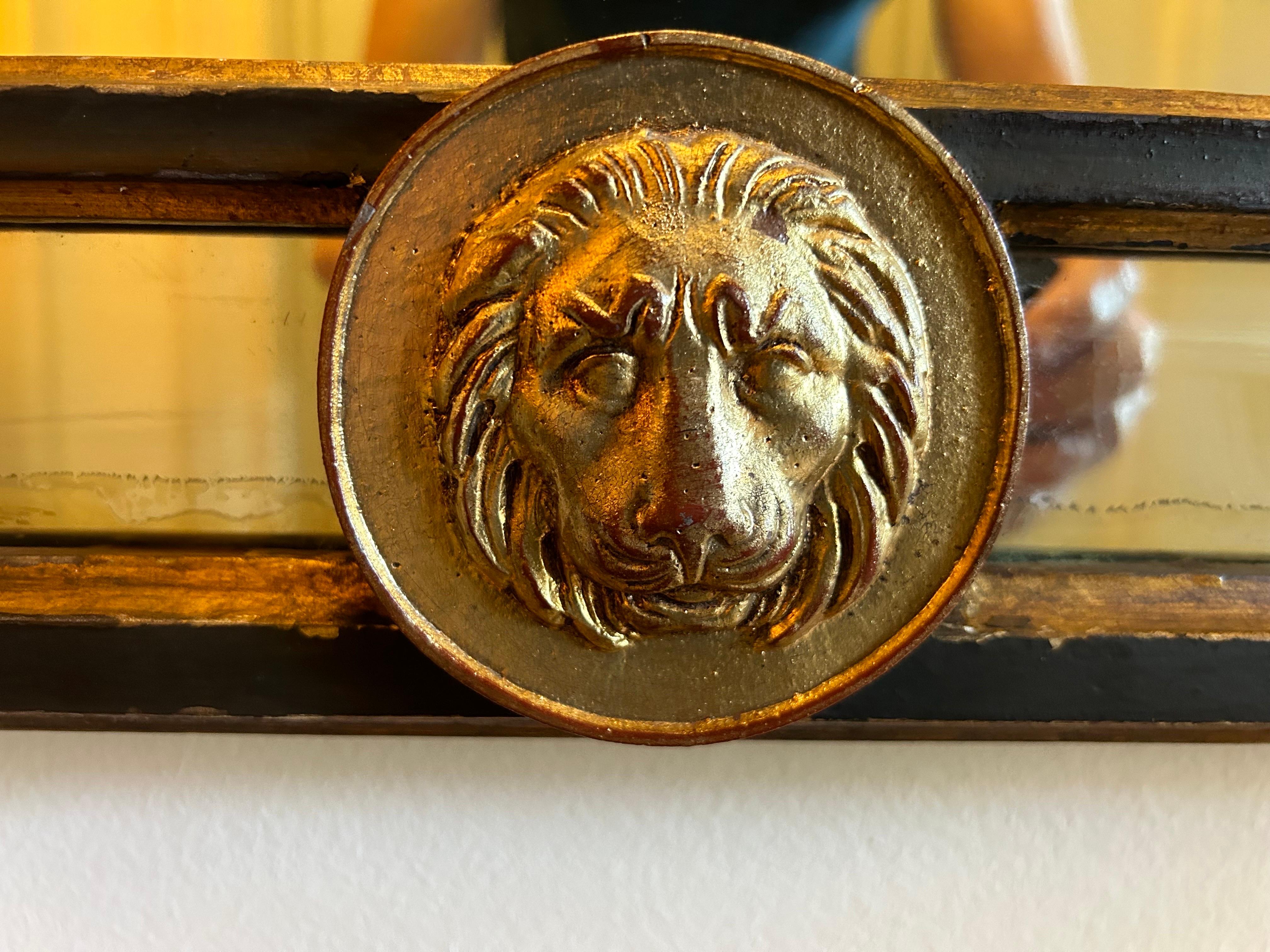 Mid-20th Century Italian Neoclassical Style Ebonized And Giltwood Mirror For Sale