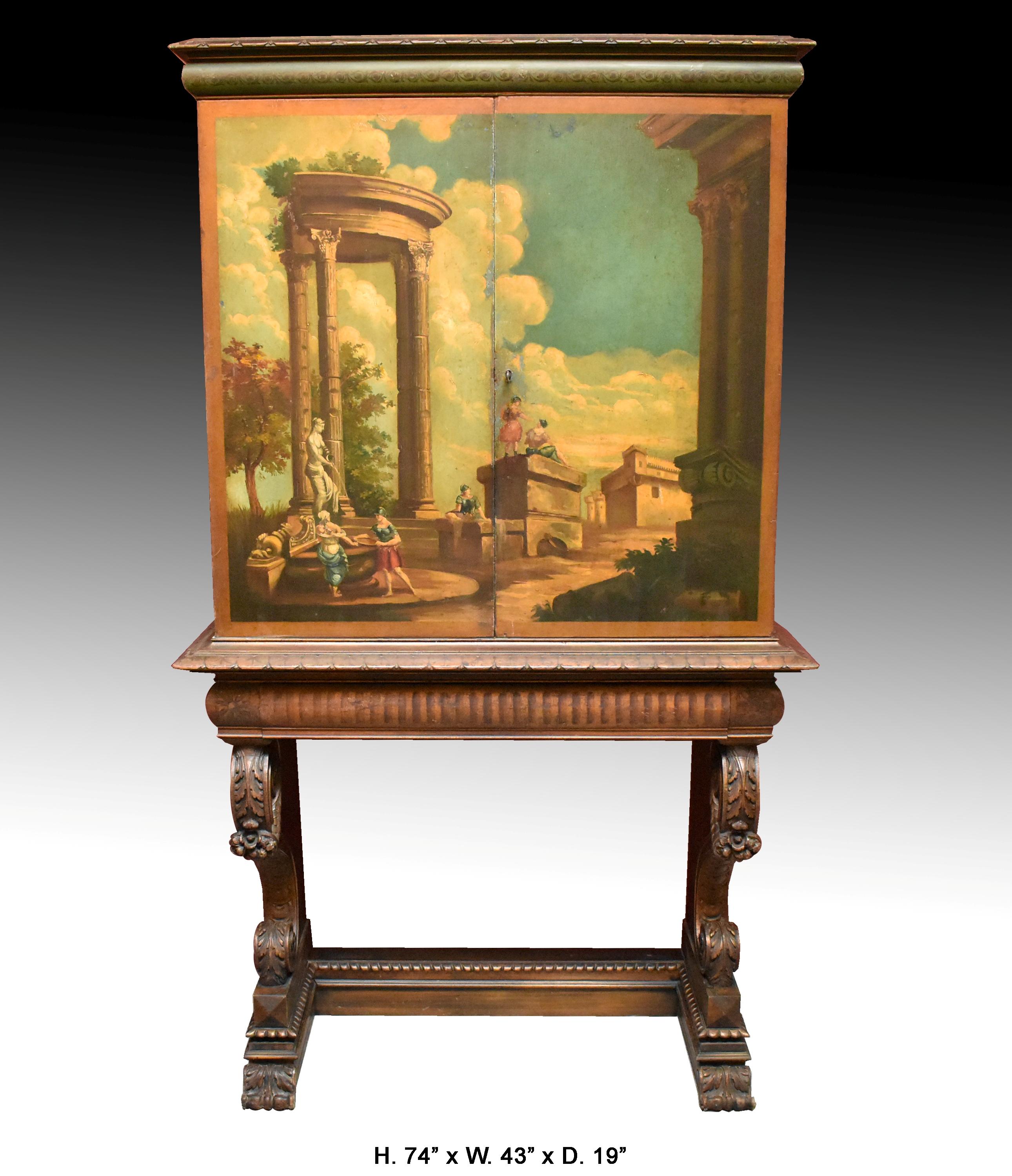 Fabulous Italian neoclassical style hand painted two-door cabinet on stand,
First half of the 20th century.

The cabinet is surmounted with a moulded cornice, above two hand-painted doors depicting a Roman architectural landscape scene with