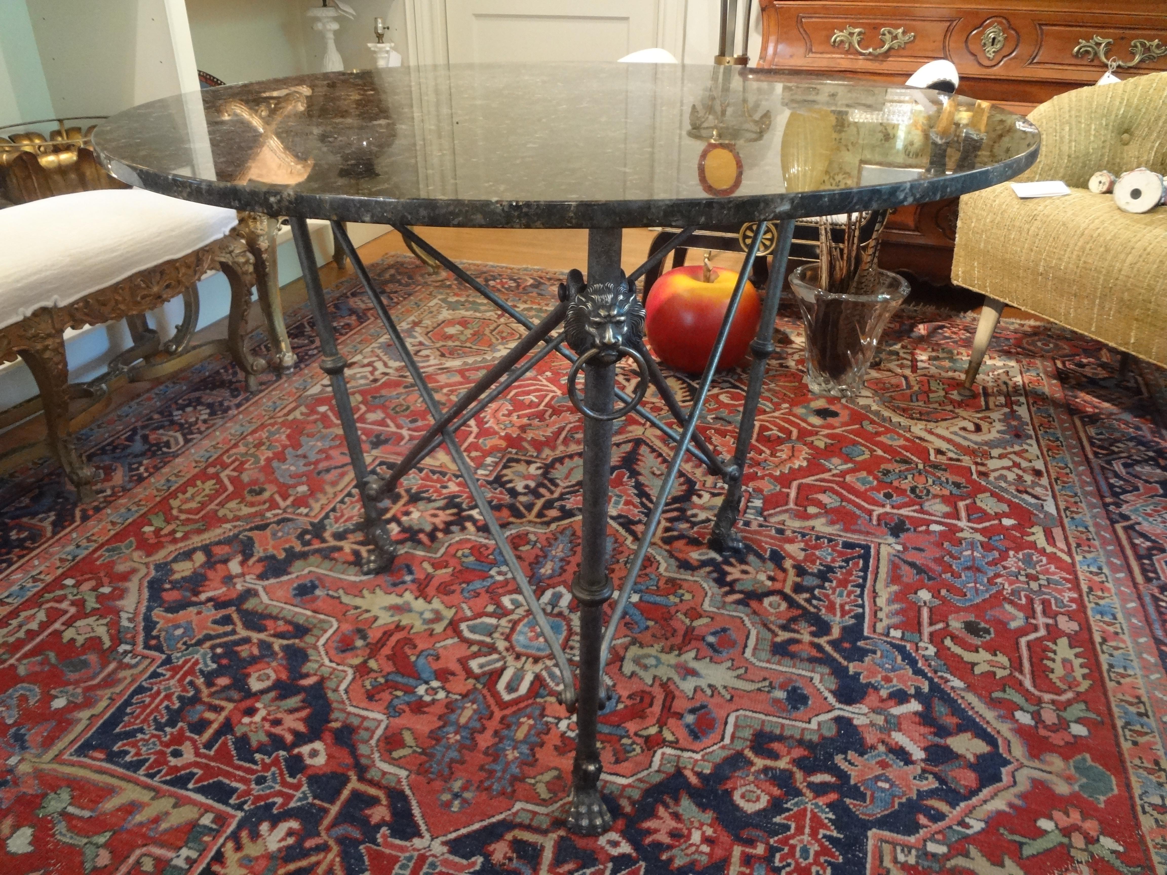 Italian steel and bronze center table.
Stunning Italian modern neoclassical style steel and bronze center table with marble top. This fabulous center table or centre table is comprised of three steel legs with bronze lions heads and paw feet. This