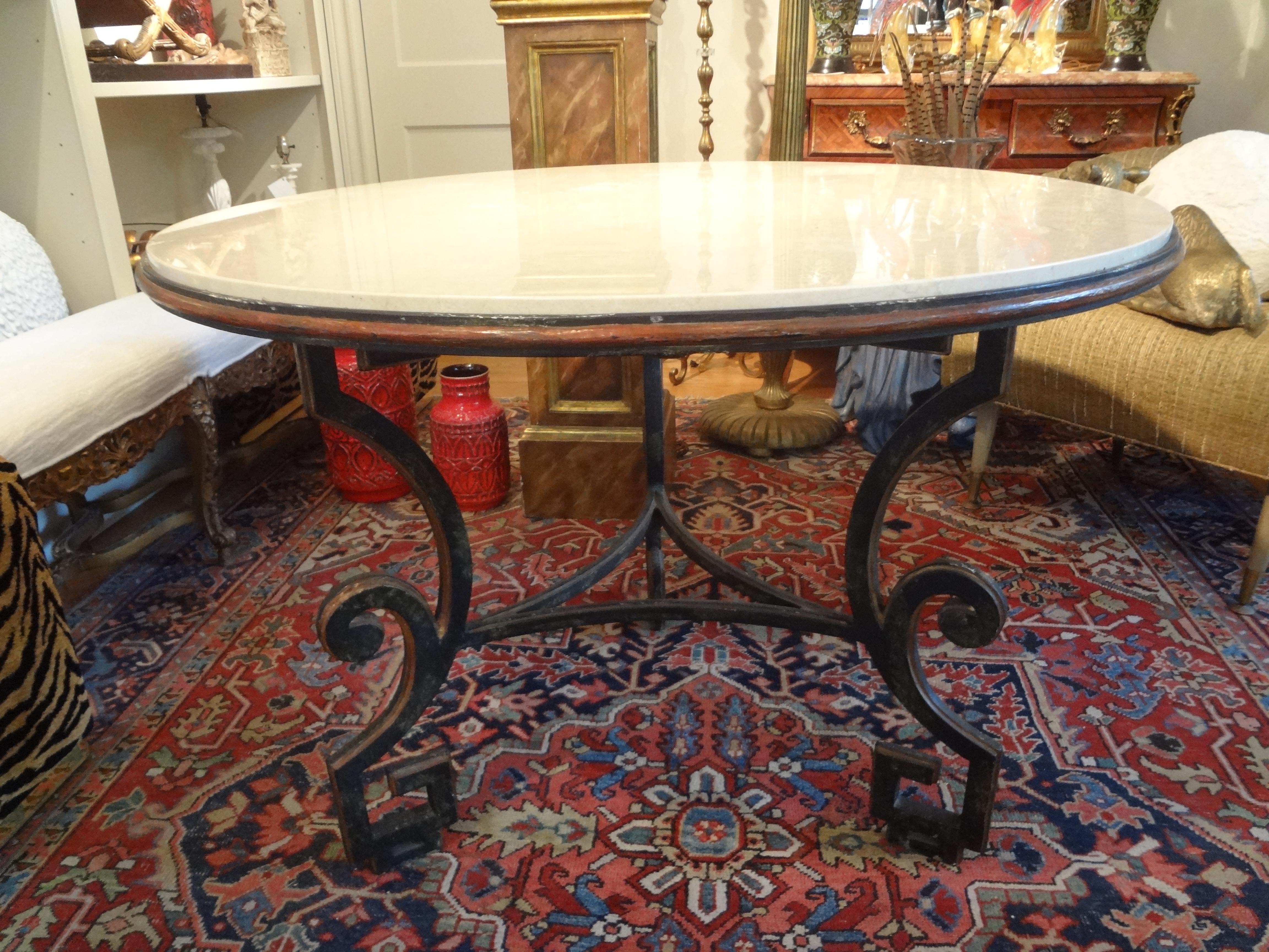 Italian Wrought Iron Center Table, Neoclassical Style
Stunning vintage Italian Neoclassical style Greek key wrought iron center table with a travertine top. Our gorgeous heavy gauge Italian iron table has Greek key legs with a travertine top