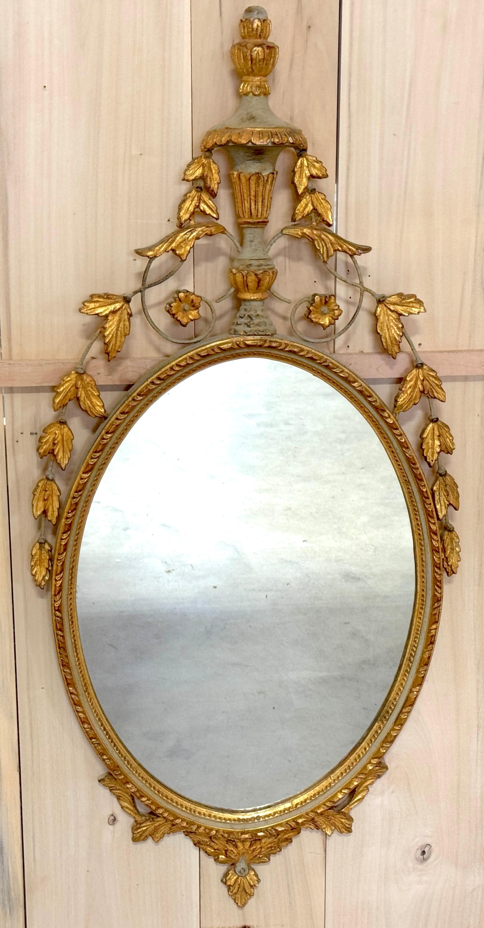 Italian Neoclassical Tuscan Green & Giltwood and Tole Mirror

Italy, Circa 1950s

An Italian Neoclassical Tuscan green and giltwood tole mirror, made in Italy circa the 1950s, is a beautifully subtle detailed work that captures the elegance and