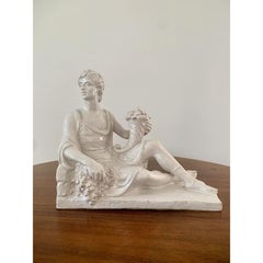 Italian Neoclassical White Porcelain Reclining Man with Cornucopia Sculpture