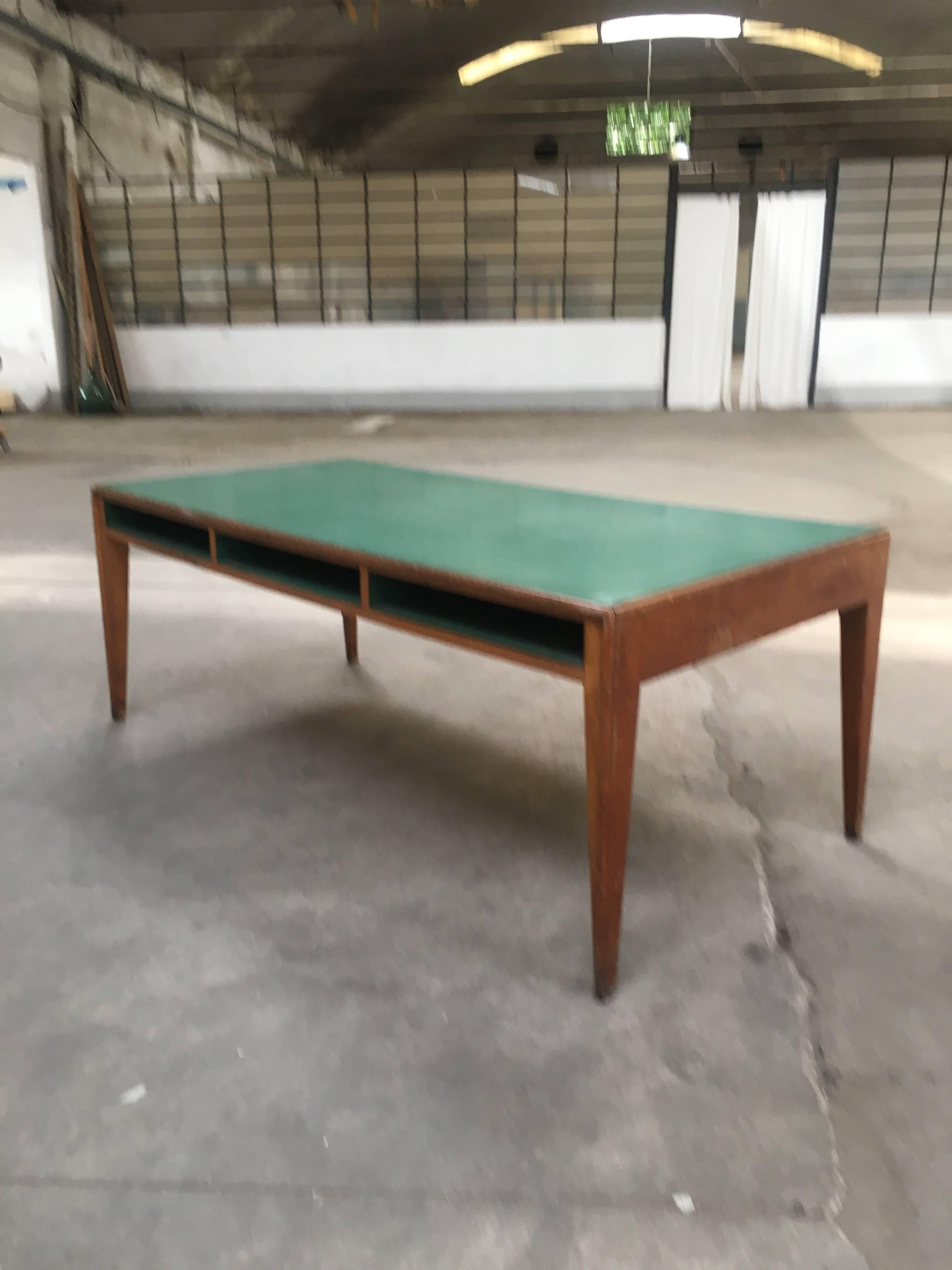 Italian oak and formica counter table from 1960s.
This table comes from a Boarding School in Turin.
 