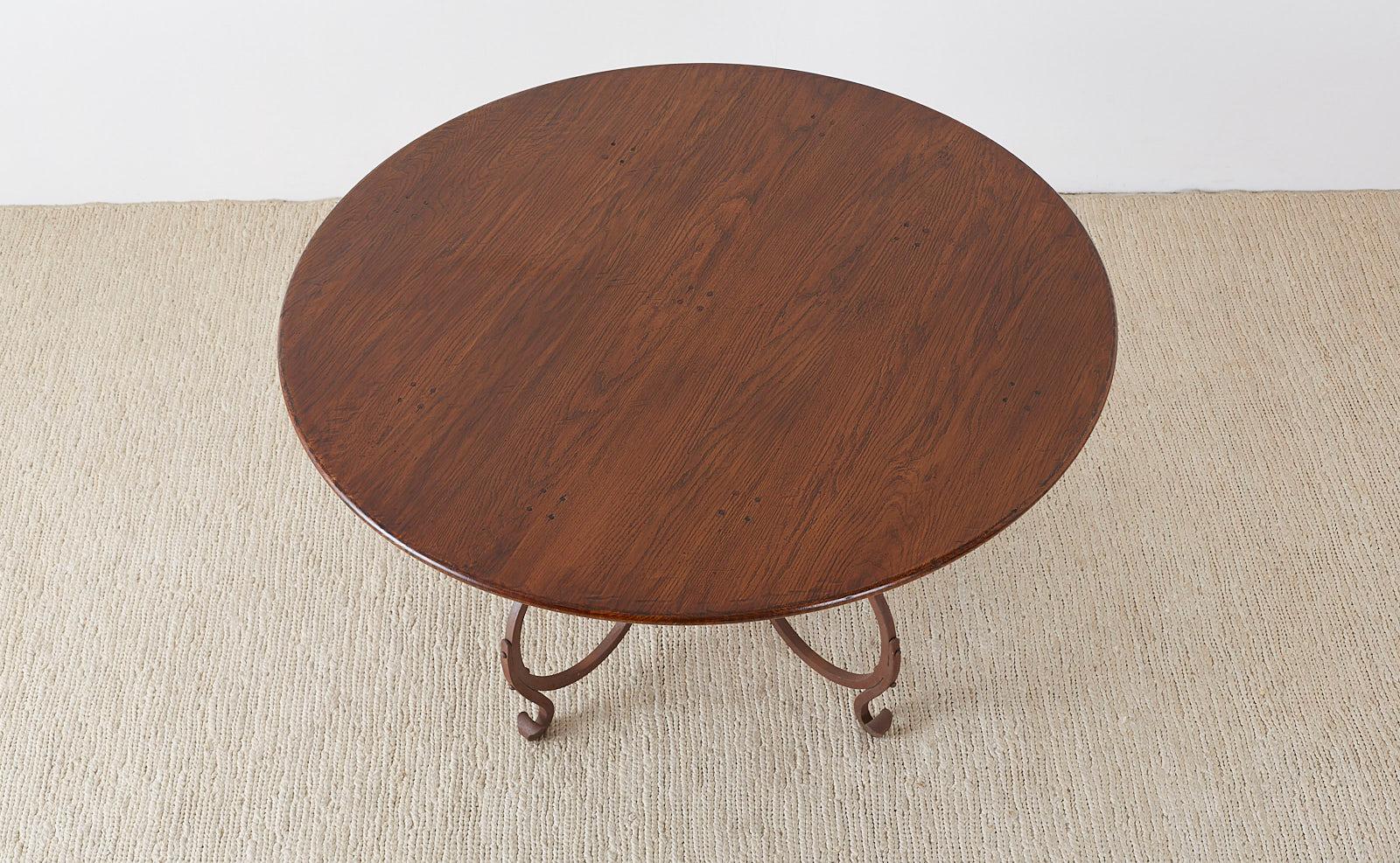 Rustic Italian Oak and Scrolled Iron Round Dining Table
