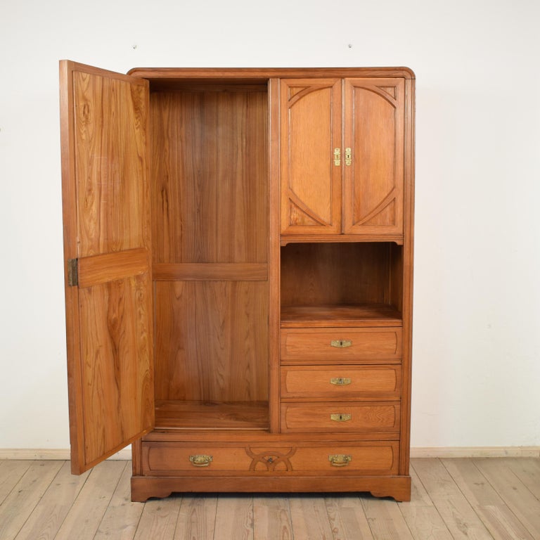 This oak Art Nouveau cabinet was made circa 1910 in Italy. It has got some great carvings and a beautiful and elegant shape.
The cabinet has got one big mirror door, a small compartment with two door and three small and one big drawer.
 
