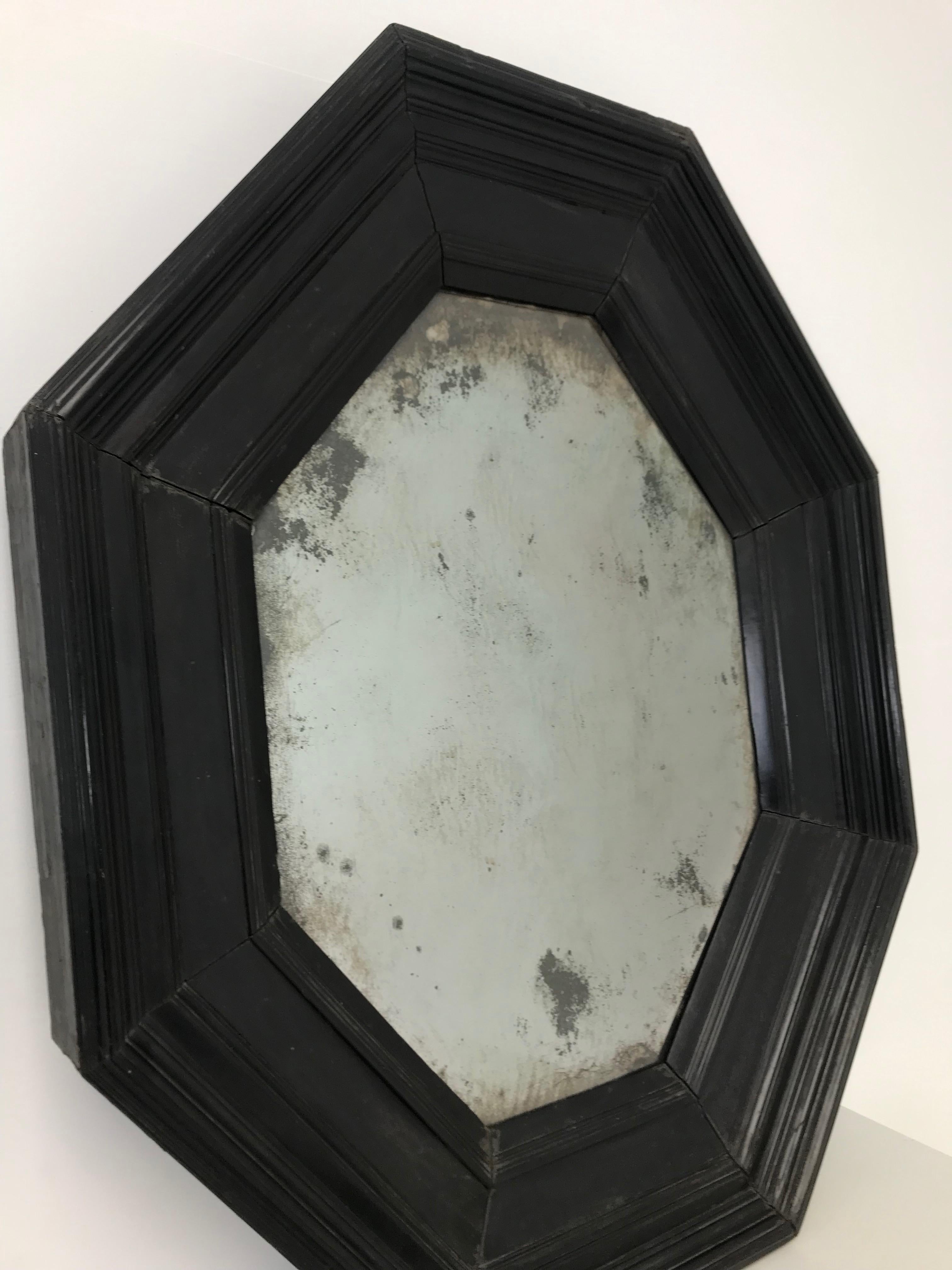 Elegant, exceptional octogonal mirror Italian mirror
18th century
Good patina
Marked, stamped CS at the back and on the side.