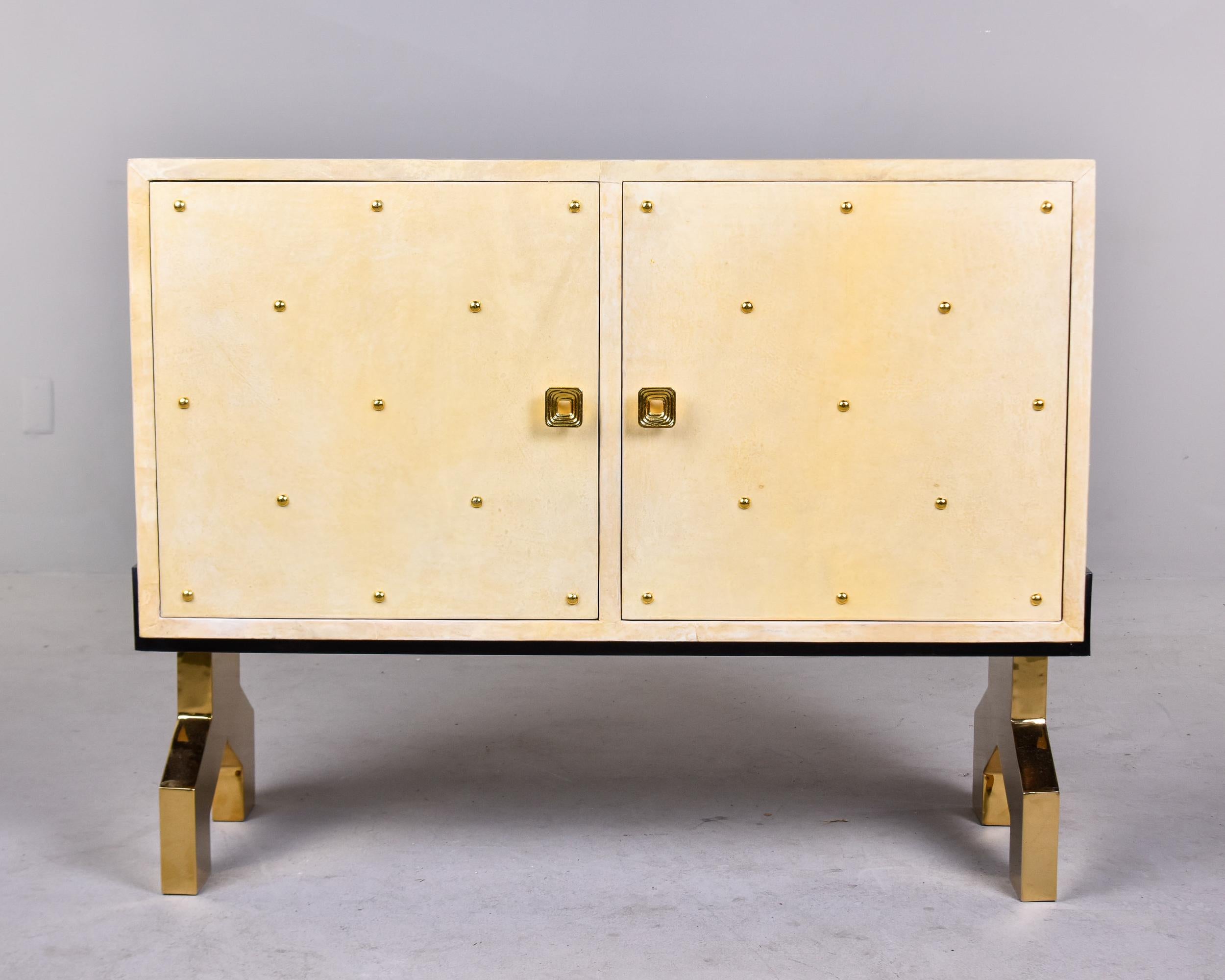 Mid-Century Modern Italian off White Parchment Covered Modernist Chest with Brass Accents and Hardw For Sale