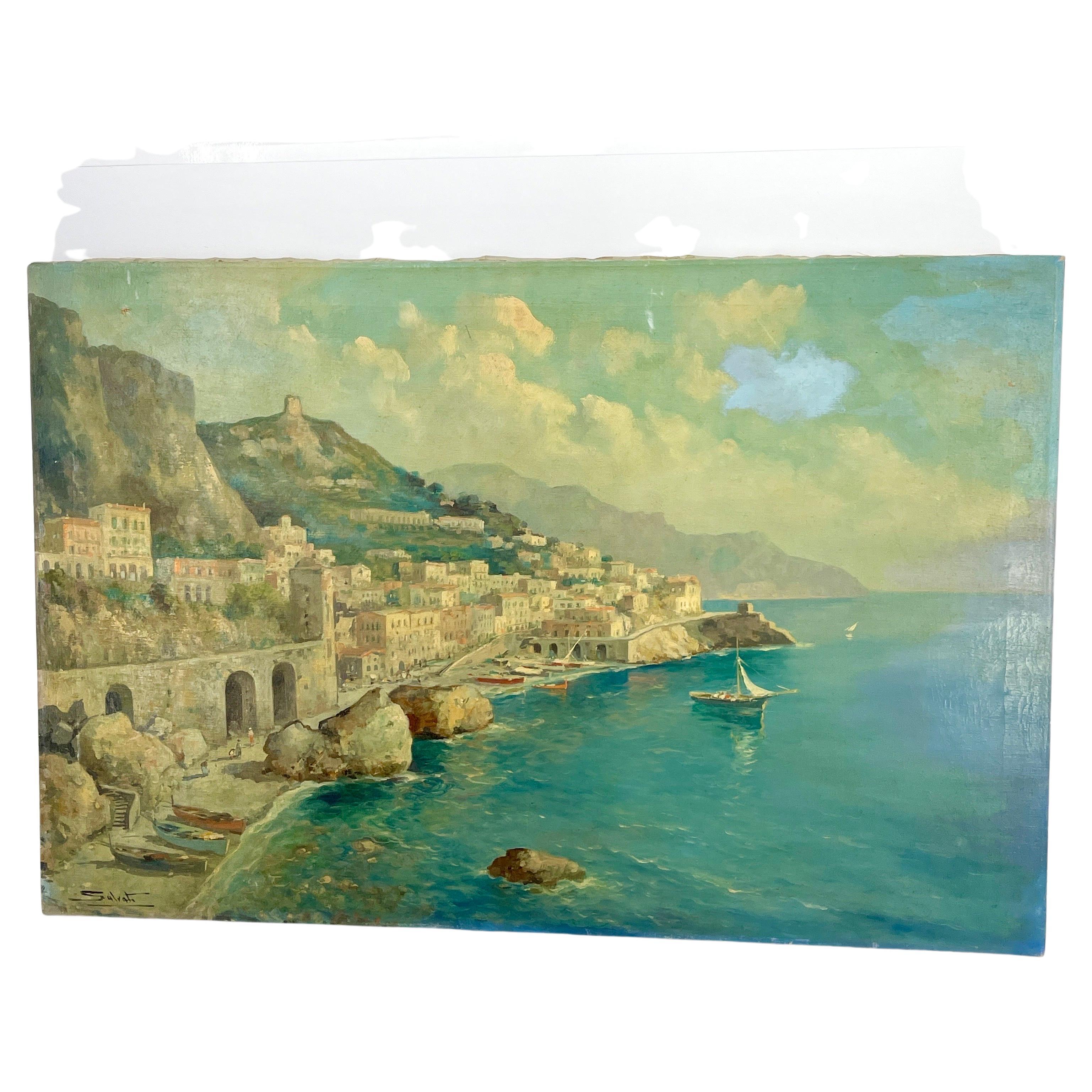 Charming oil on canvas painting of an Italian coastal city scene with sail boats, signed, circa 1950's.   
A very lifelike rendering of an Italian coastline. This 20th Century oil painting features mountains, buildings, beach and fishing boats.