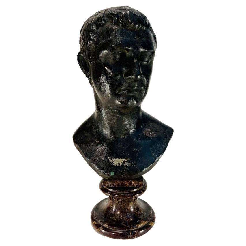 Italian old black bronze bust for 'Roman Emperor' with marble base circa 1800. For Sale