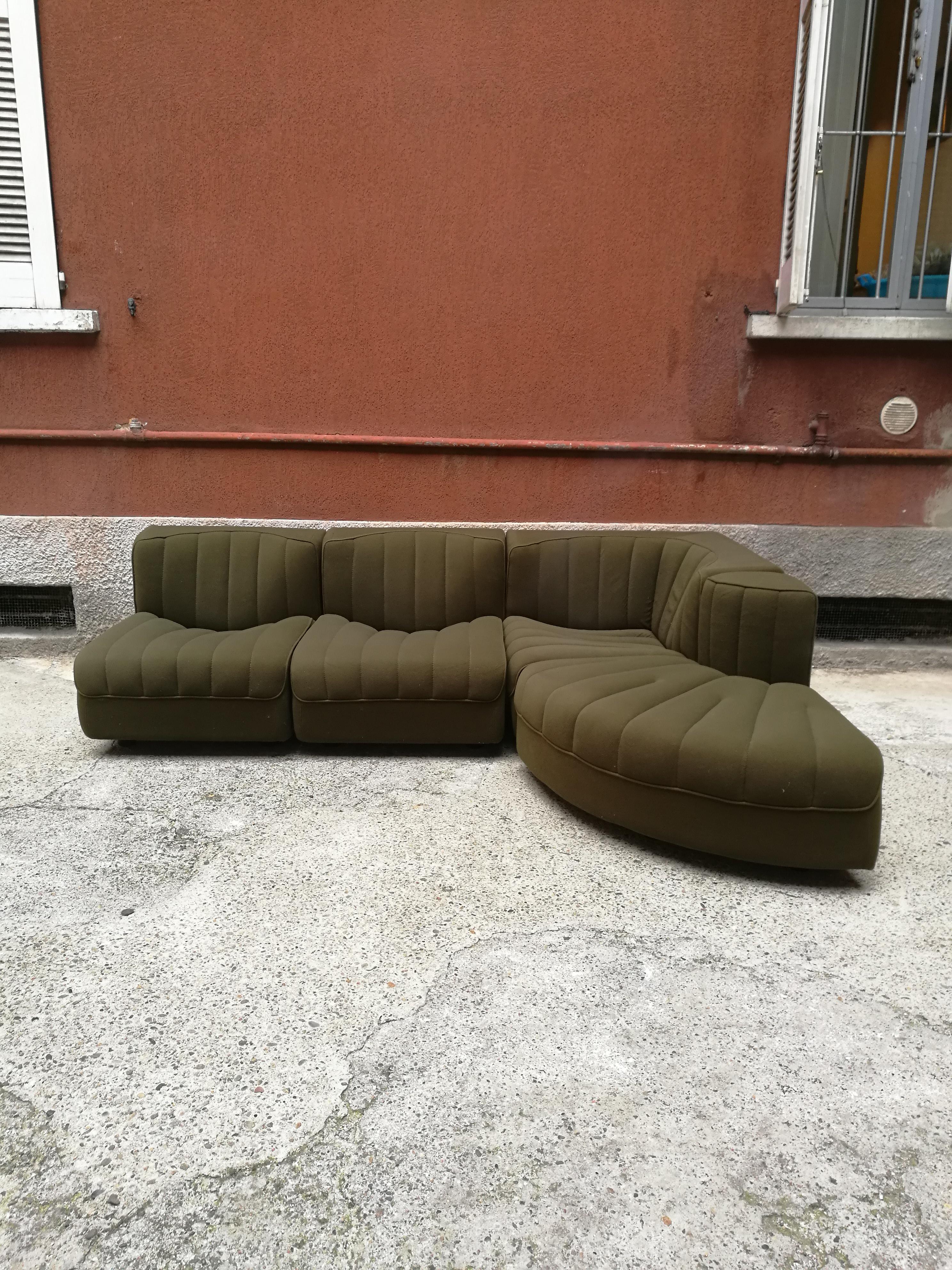 Italian olive green felt modular original sofa, 1970s
Unusual modular sofa from the 1970s. Arrange them as you like! Original olive green and similar to felt but very soft fabric upholstery. The Sofa consists of 4 modules, two of which twins, one