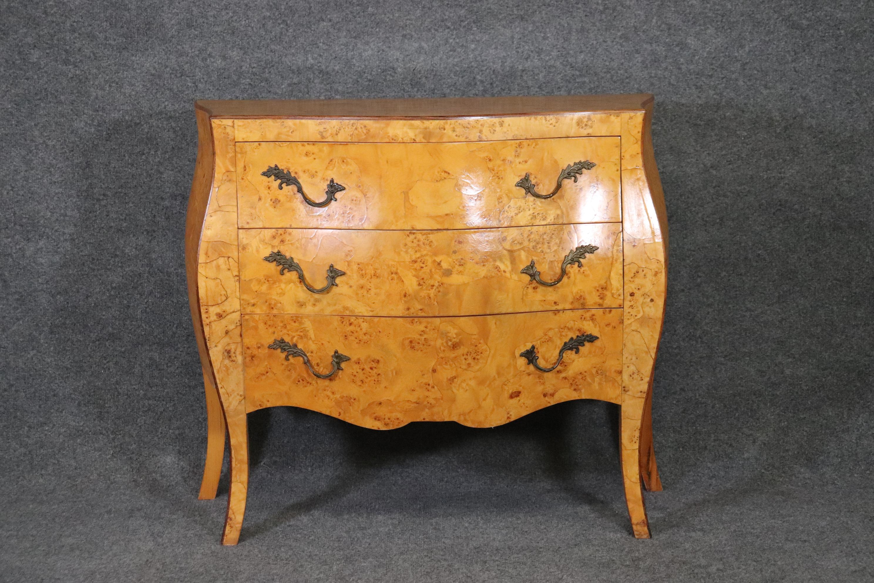 Dimensions- H: 29 1/2in W: 35 1/4in D: 15in
This beautiful Italian olive wood commode, dresser, chest of drawers was made with high quality! the weight of the piece shows that the chest was made with high quality wood. the entire Commode is