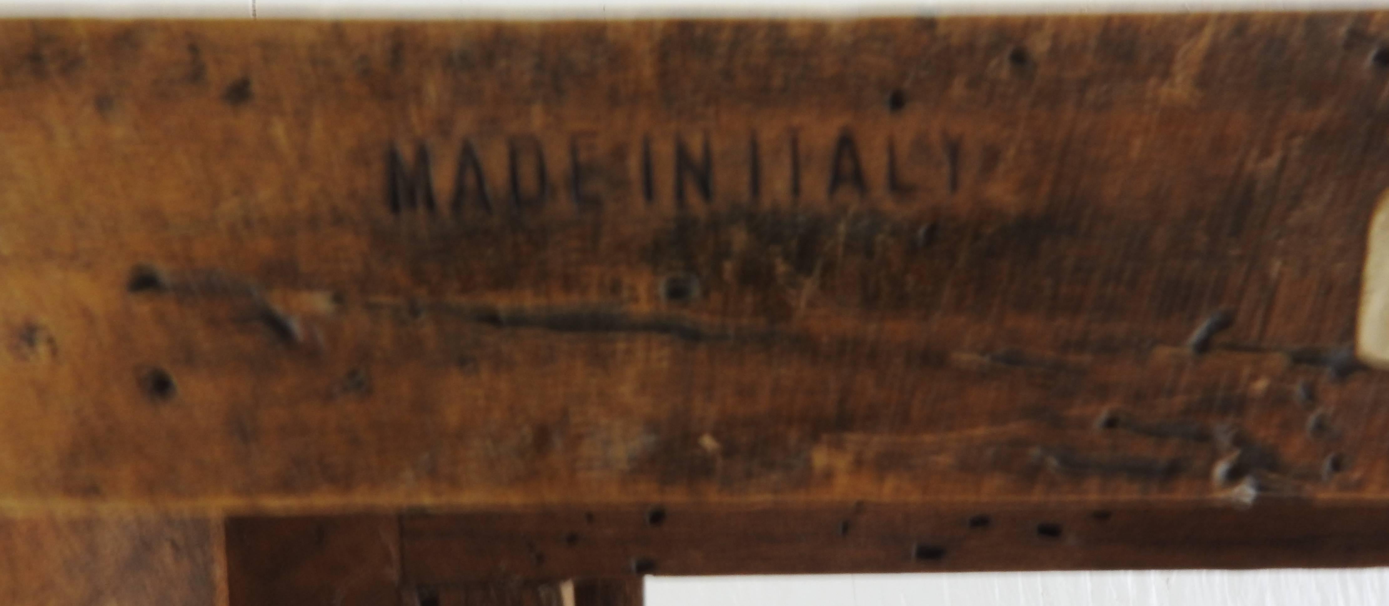 This is unique olive wood book stand that is on a pivot. It was made in Italy and is marked on the back.