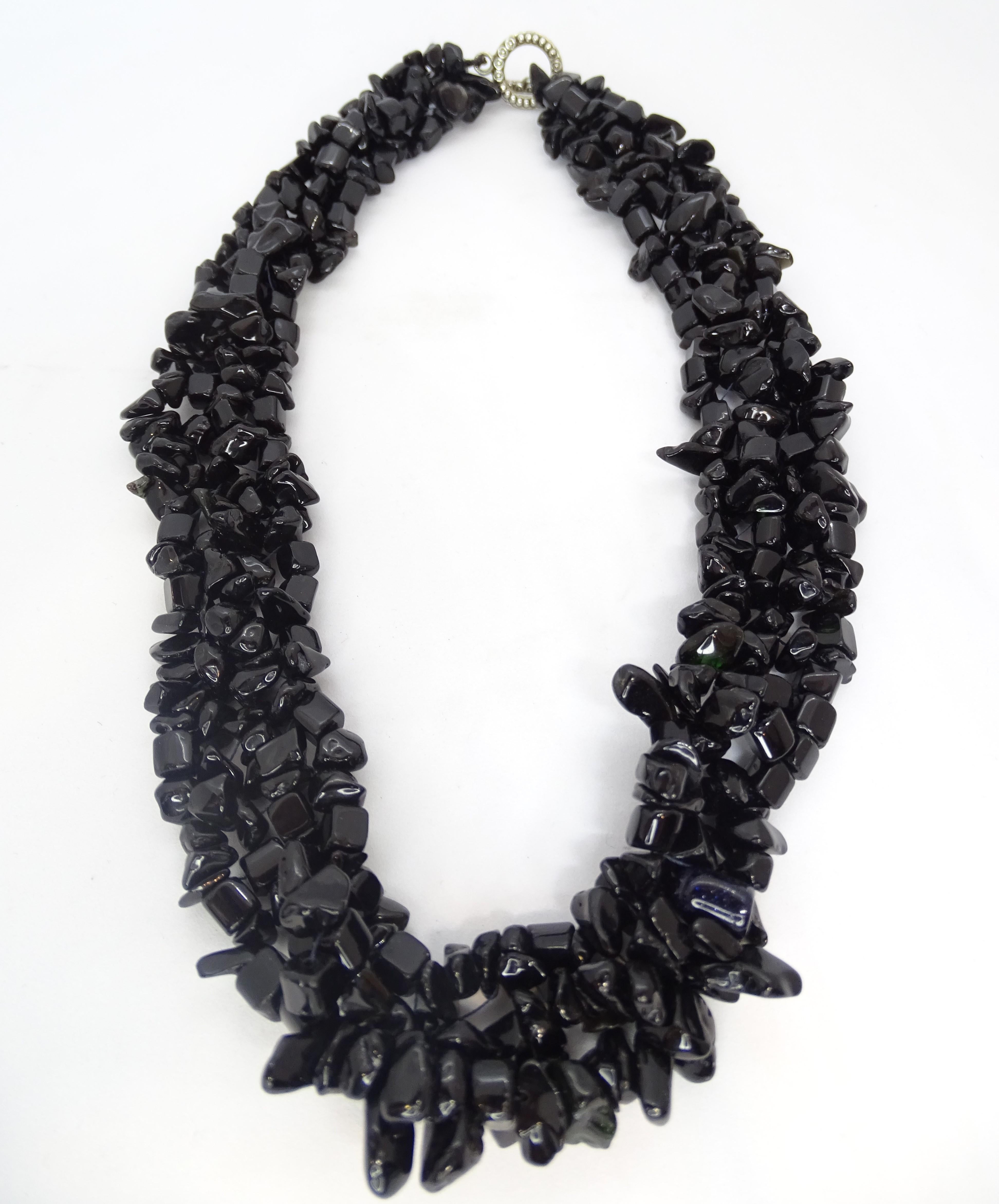 Amazing Onyx and silver braided thread necklace, 90’s – Italy.
Technical Data
Typology: Collar
Material: Silver, onyx
Period: 1980s
Country of origin: Italy
Good condition according to its age and use
Diameter size: 20 cm.

Exquisite vintage
