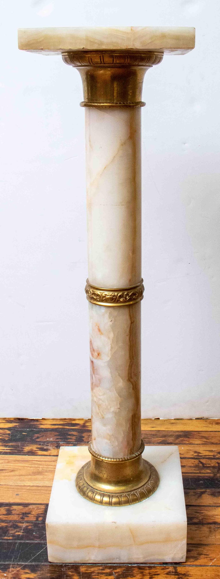 Italian Onyx Pedestal with Brass Details For Sale at 1stDibs