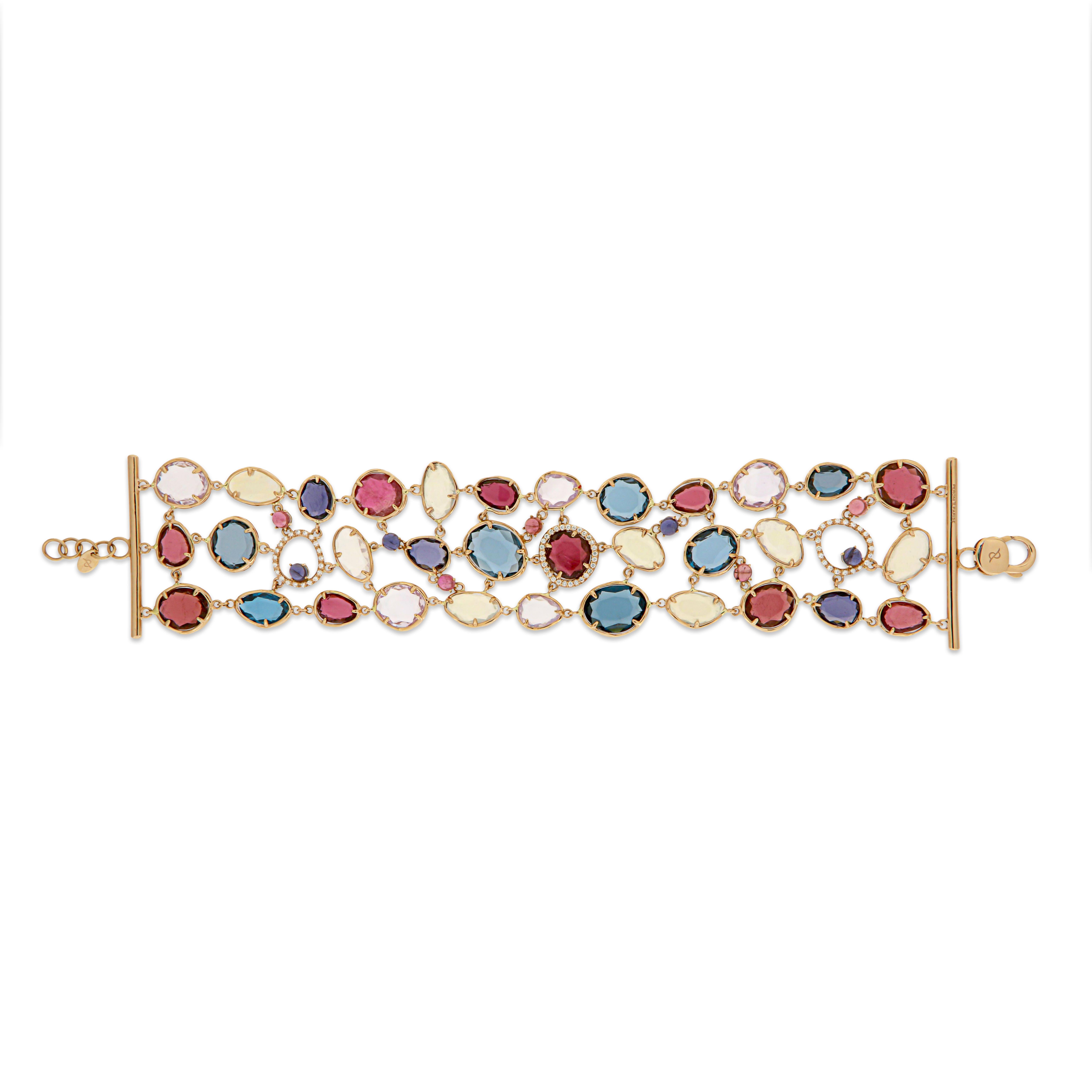 Bracelet Rose 18K Gold 
London blue topaz
Opal
Diamond 0,99 ct
Sunflower Quartz, Lilac Quartz 
Pink Tourmaline

Size 21
Weight 45.8

It is our honour to create fine jewelry, and it’s for that reason that we choose to only work with high-quality,
