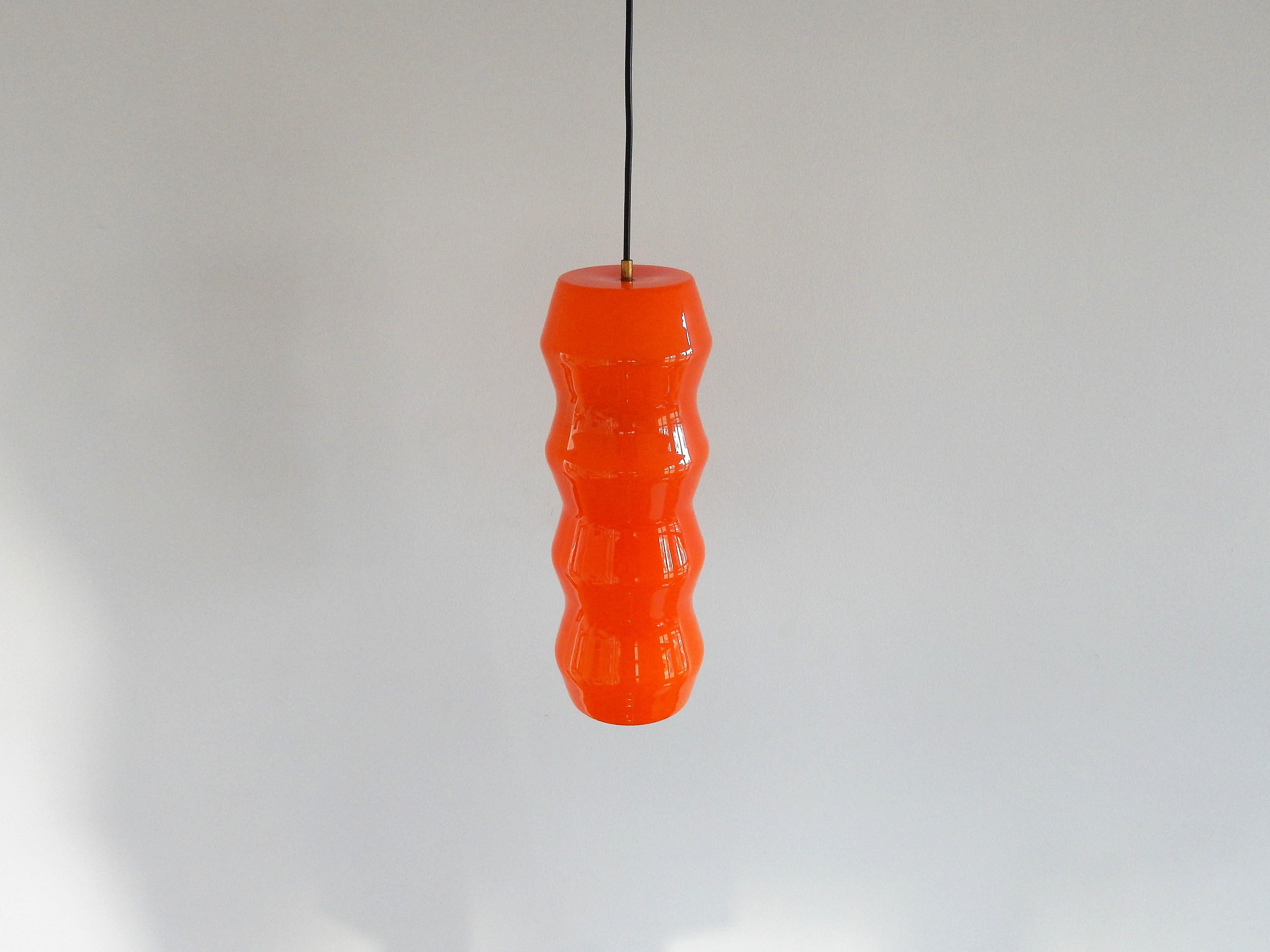 This glass pendant light is documented in a catalogue by the company of 'Indoor'. This was the importer and dealer of light brands as Vistosi, Venini and Arteluce in The Netherlands. They do not connect this light to a designer or producer in the
