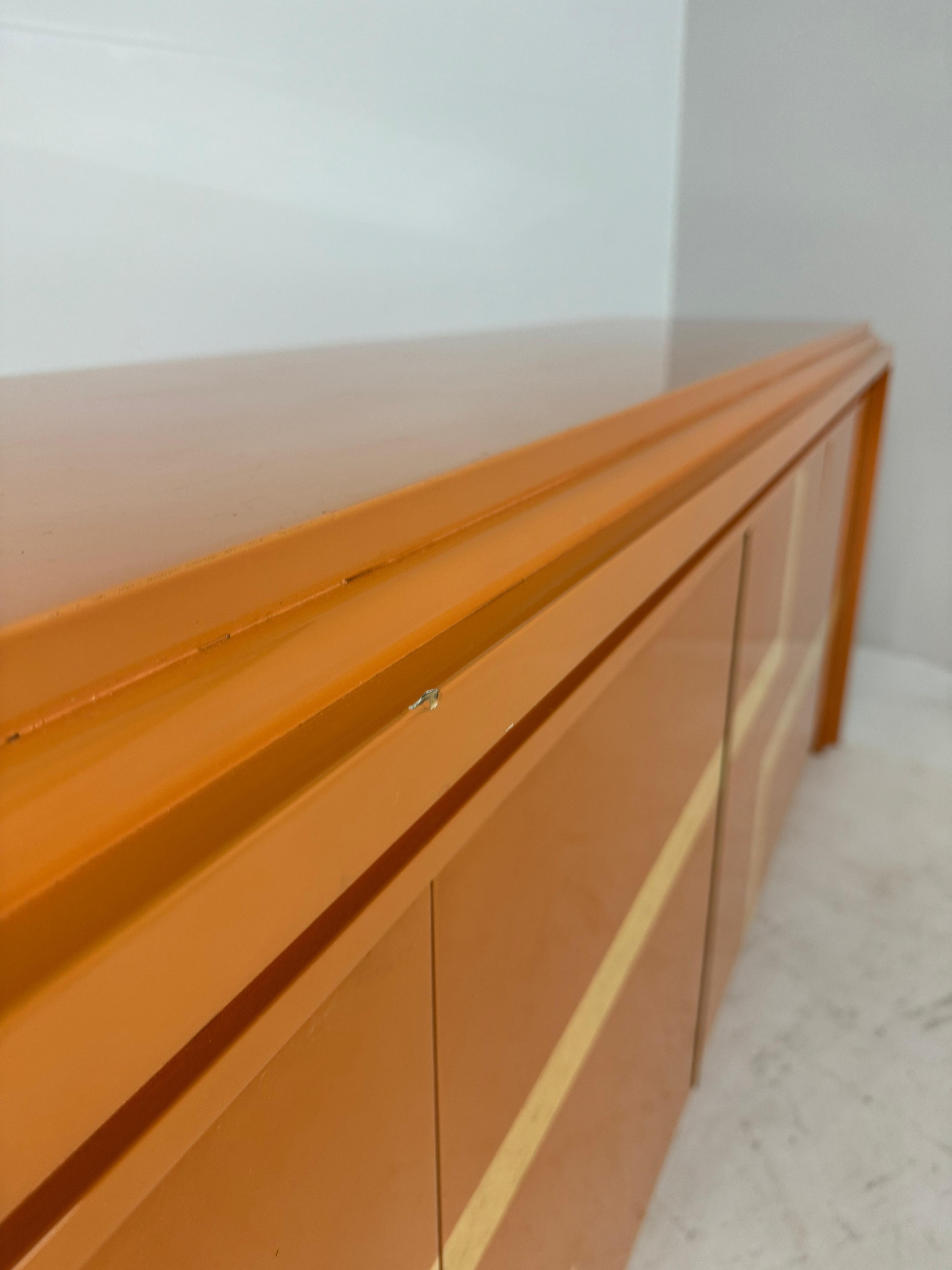 Late 20th Century Italian orange lacquered sideboard with inlay, 1970s For Sale