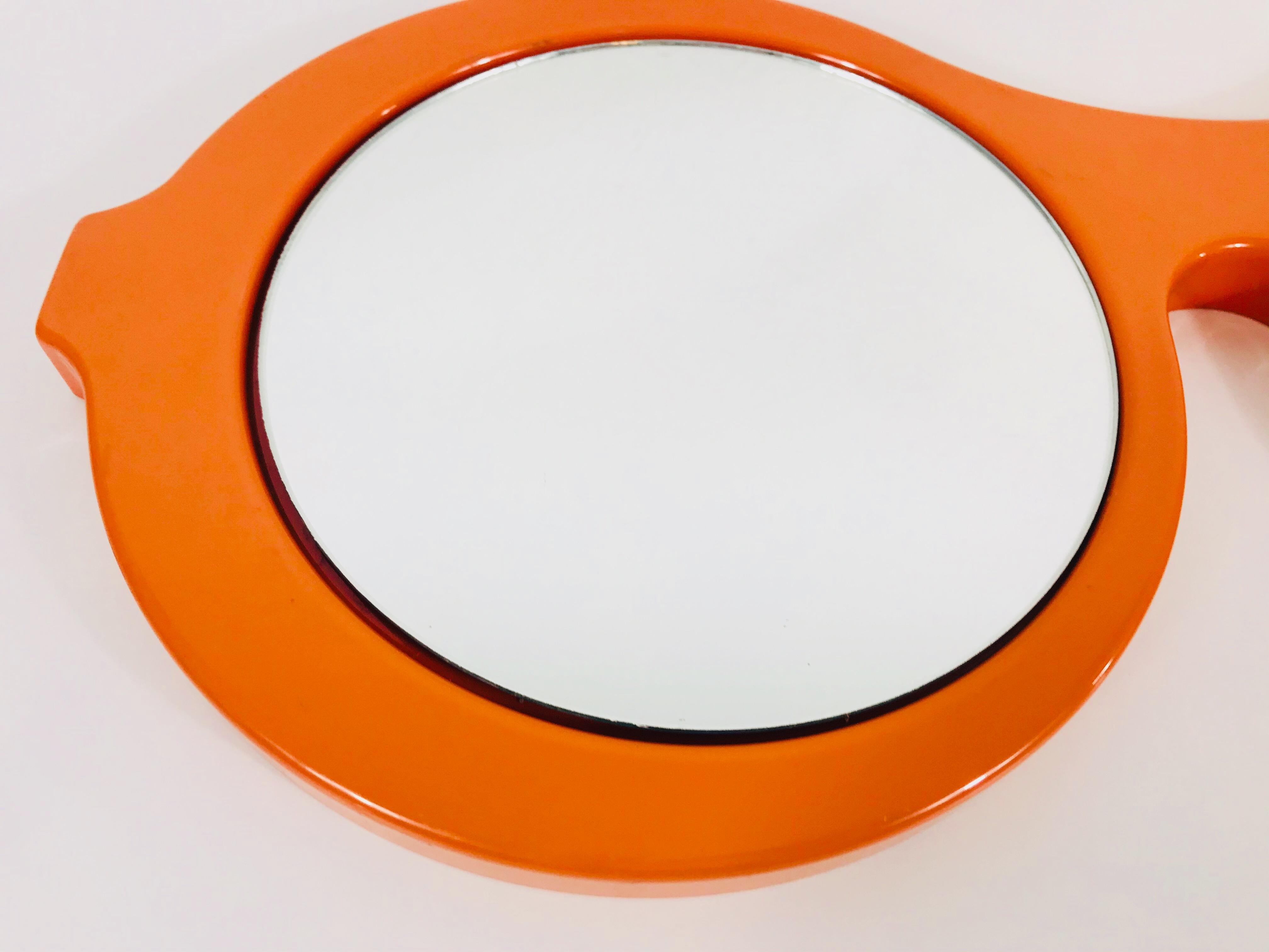 Italian Orange Plastic Wall Mirror in the Shape of Sunglasses, 1970s, Italy In Good Condition In Hagenbach, DE