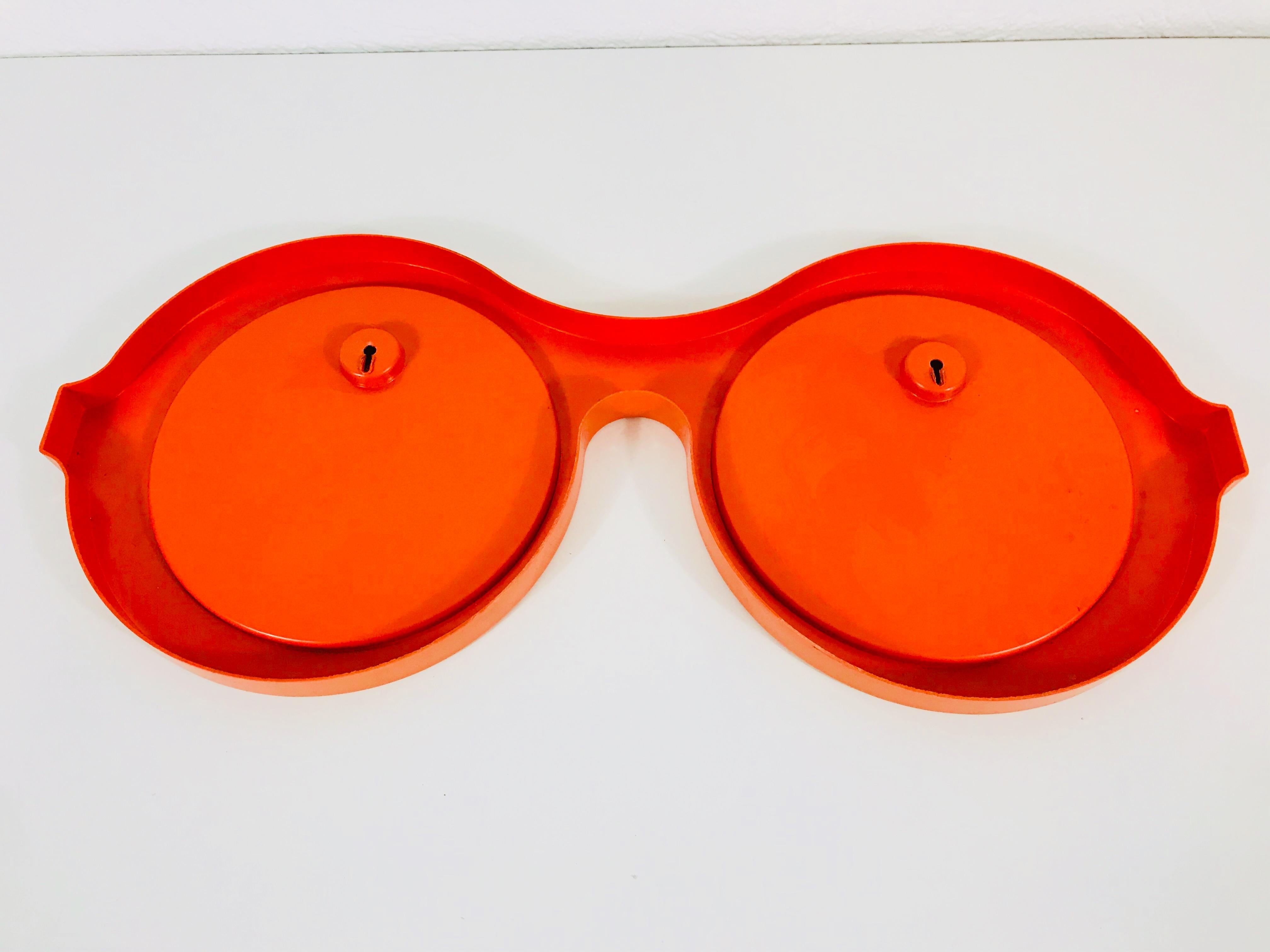 Late 20th Century Italian Orange Plastic Wall Mirror in the Shape of Sunglasses, 1970s, Italy
