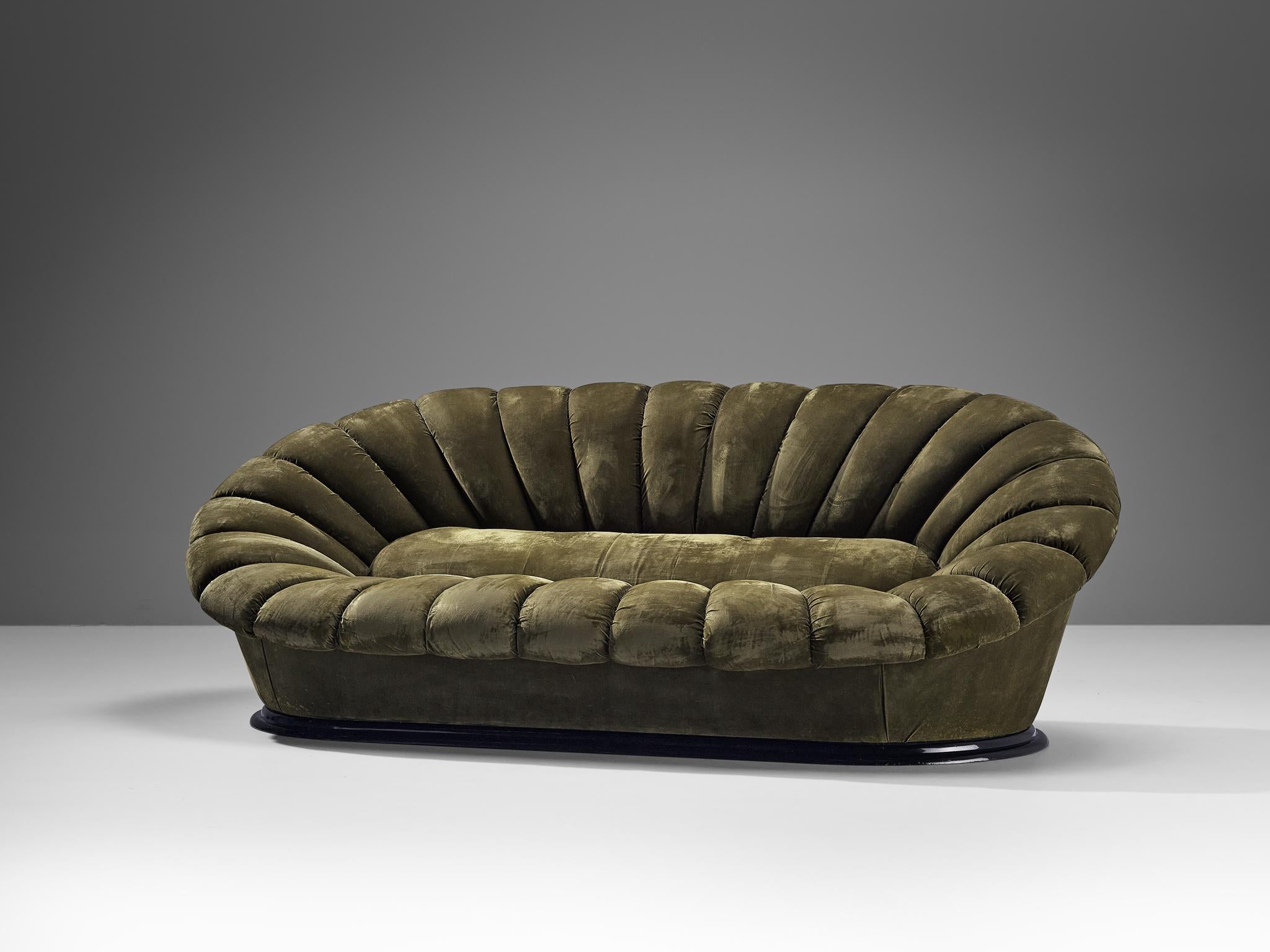 Sofa, velvet, plastic, Italy, 1970s

Eccentric and visually pleasing sofa of Italian origin. The construction of the sofa reminds of the anatomy of the flower with its inward-facing tufted lines and a stuffed middle section. The whole unit is