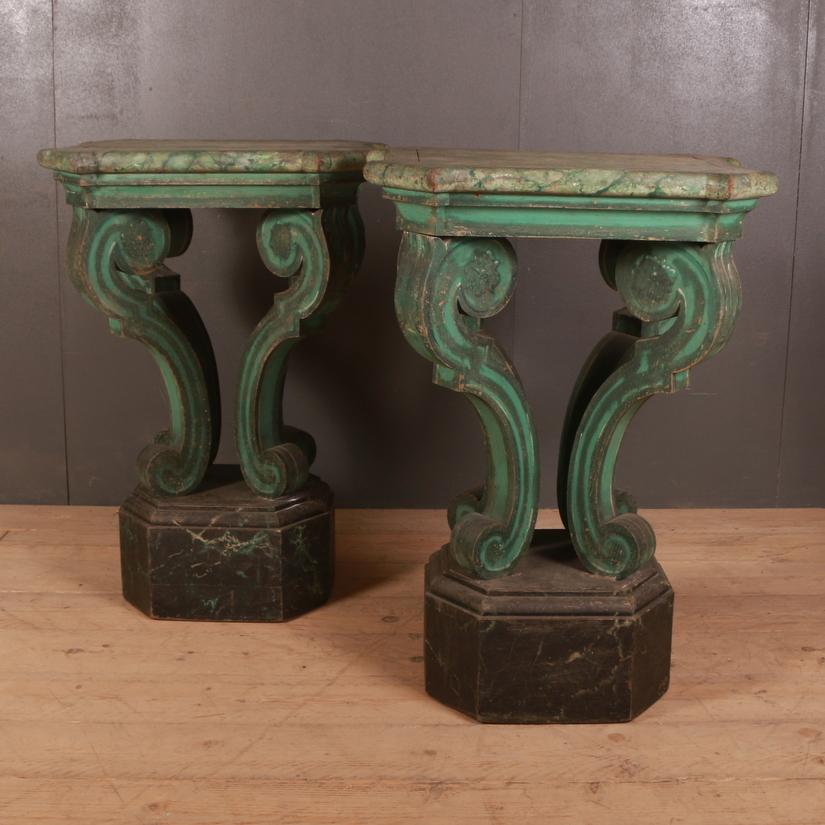 Wonderful pair of 19th century Italian original painted console tables, 1840.

Dimensions:
29 inches (74 cms) wide
21 inches (53 cms) deep
40.5 inches (103 cms) high.

 