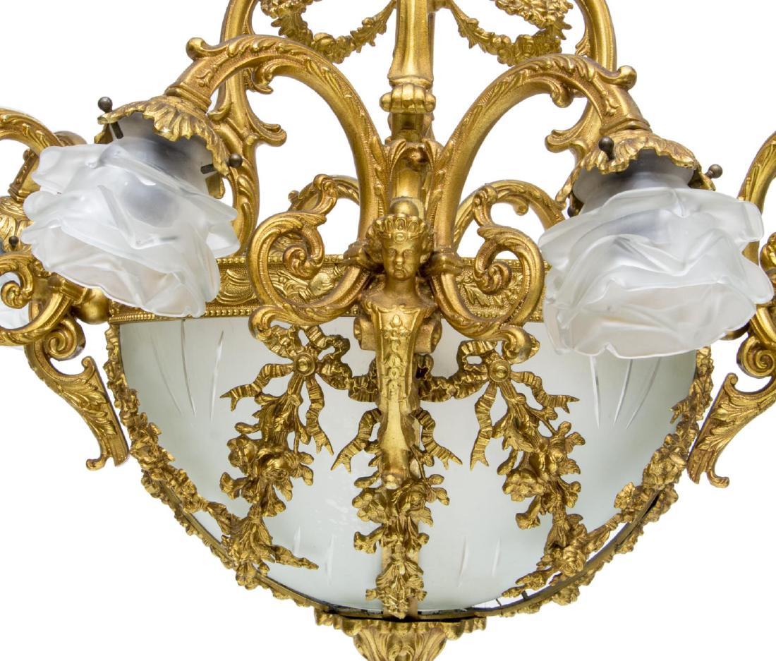 Gilt Italian ormolu 9 light chandelier with crystal shades  For Sale