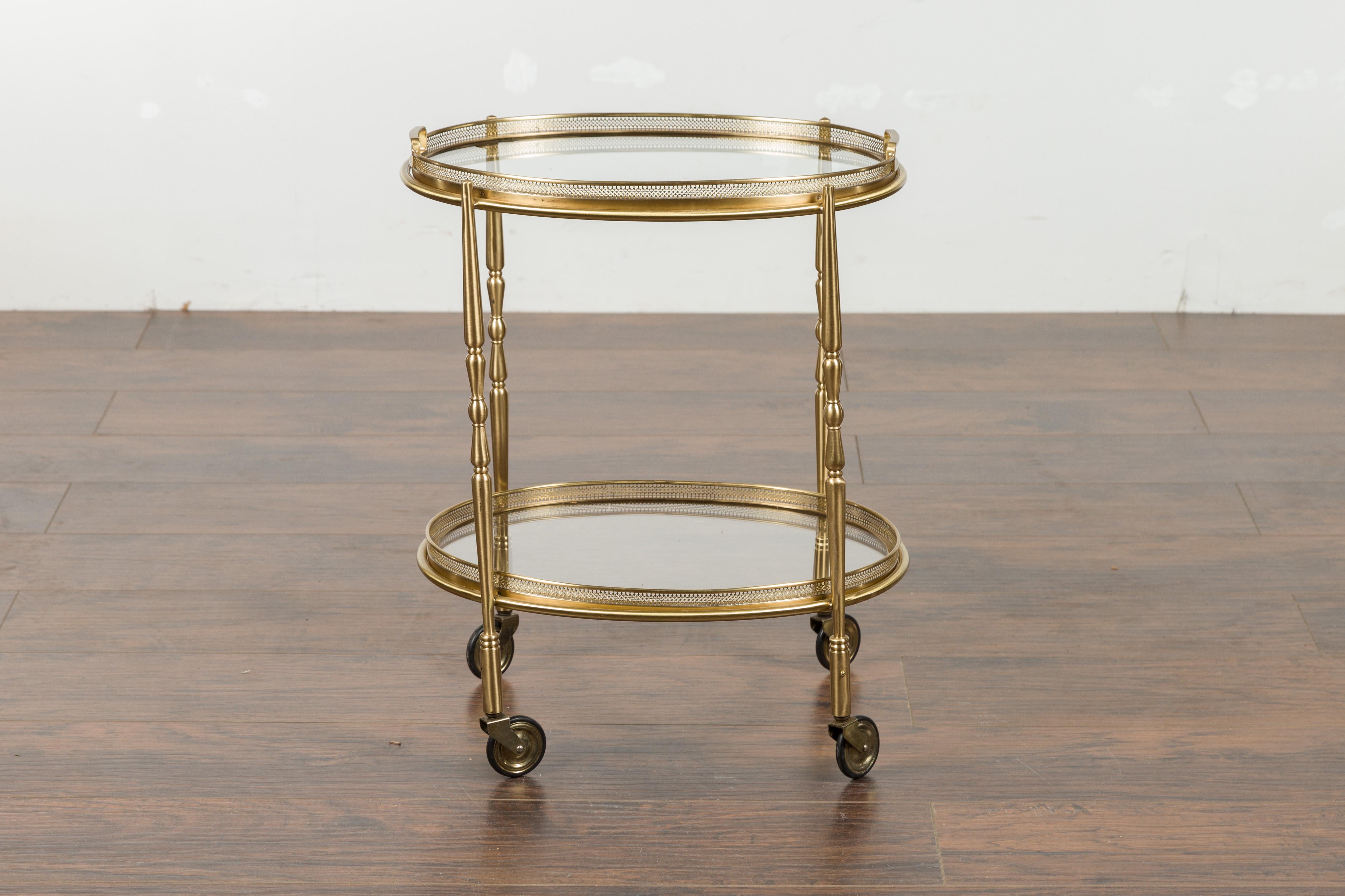 Italian Oval Brass Cart with Pierced Gallery, Glass Shelves and Casters In Good Condition In Atlanta, GA