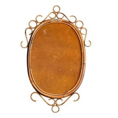 Italian Oval Burnt Bamboo Rattan Scrolled Tortoise Mirror After Franco Albini